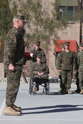 Corporal Jonathan Dowdell received the  Navy Marine Corps Achievement  Medal with Combat distinguishing Device in front of his former unit, Company K, 3rd Battalion, 7th Marine Regiment, Jan. 7, 2011.