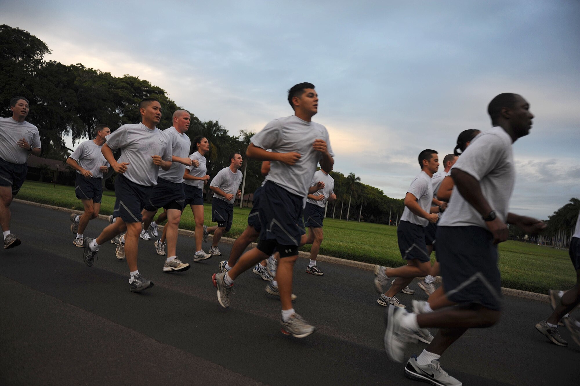 Airmen from the 15th Comptroller Squadron keep a steady pace during the Warrior Run Jan. 7 at Joint Base Pearl Harbor-Hickam. Nearly 1,100 participants ran the approximately two-mile course. (U.S. Air Force photo/Airman 1st Class Lauren Main)