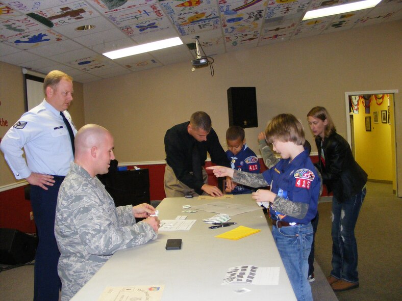VALDOSTA, Ga.-- Jonathan Little and Kurt Pinkowski , 23rd Security Forces Squadron Investigations section, demonstrate fingerprinting techniques to Bear Scouts as Tech. Sgt. James McKee, 23rd SFS information fusion cell, observes Jan. 3. As a way to strengthen community relations and teach the boys about law enforcement, the 23rd SFS educated them on many topics including crime scene analysis, crime prevention techniques and “stranger danger.” At the end of the night, the scouts were awarded certificates by Capt. Justin Secrest, the squadron’s commander.  (Contributed photo)(RELEASED)

Moody has no official affiliation with the group and does not intend to endorse them.
