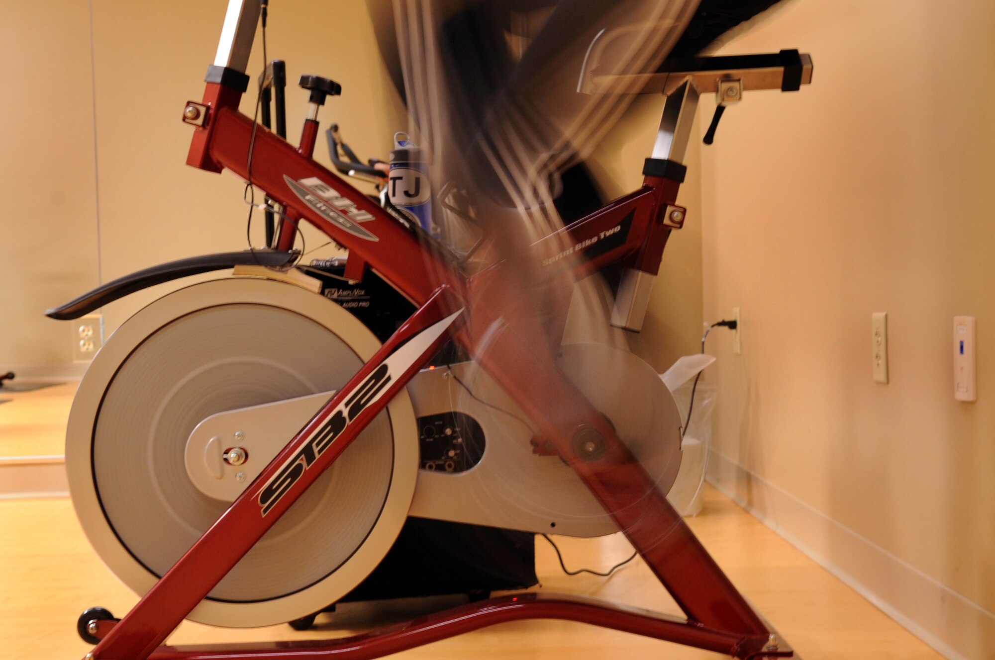 MOODY AIR FORCE BASE, Ga. -- Staff Sgt. Tanja Moore, 23rd Force Support Squadron sports director, quickly peddles a spin bike in the new Aerobics Center Jan. 7.  The full aerobics schedule can be found at www.moodyfss.com. (U.S. Air Force photo/Airman 1st Class Douglas Ellis)(RELEASED)
