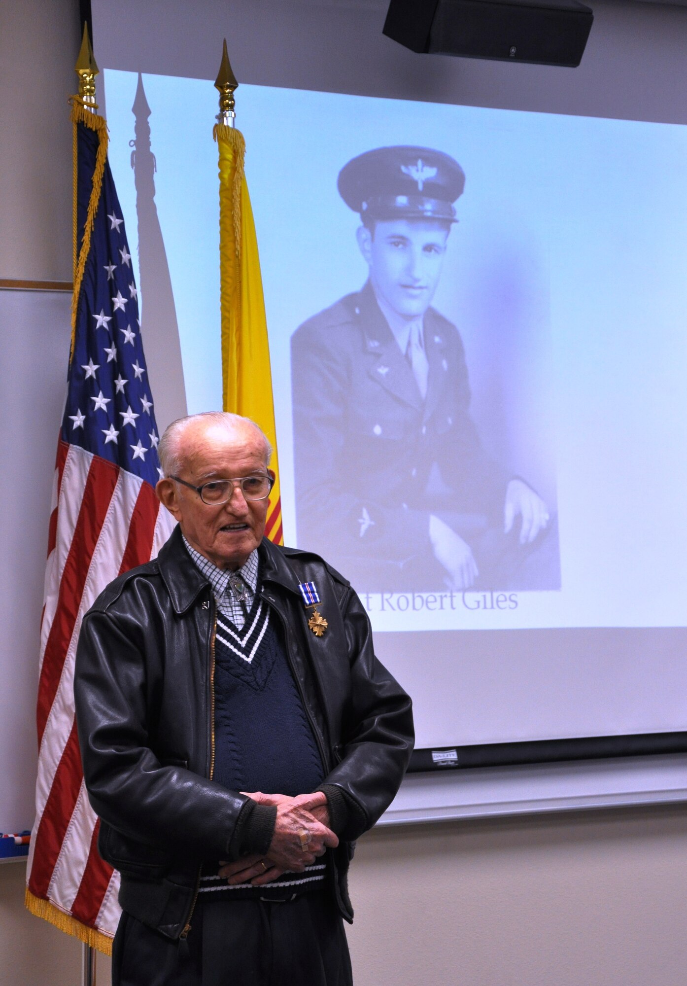 Army Air Corps veteran 2nd Lt. Robert L. Giles received the Distinguished Flying Cross in a Dec. 29 ceremony at Kirtland Air Force Base. During World War II, Lieutenant Giles, a B-17 navigator, saved the life of a severely wounded crewmate. Photo by Army Staff Sgt. Suzanna Dominguez