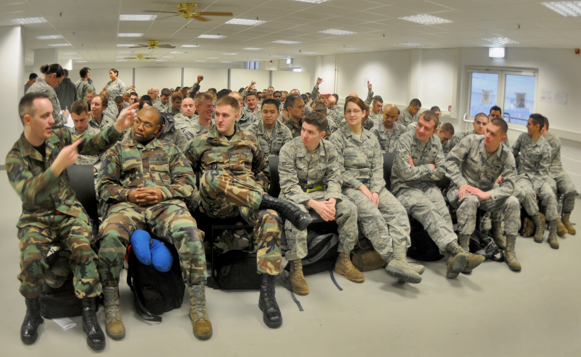SPANGDAHLEM AIR BASE, Germany – Airmen from the 480th Fighter Squadron wait to receive briefings in the 52nd Logistics Readiness Squadron building before leaving for Nellis Air Force Base, Nev., to participate in a Red Flag training exercise Jan. 7. The 480th FS will participate in Red Flag from Jan. 22 – Feb.  4. (U.S. Air Force photo/Senior Airman Nick Wilson)