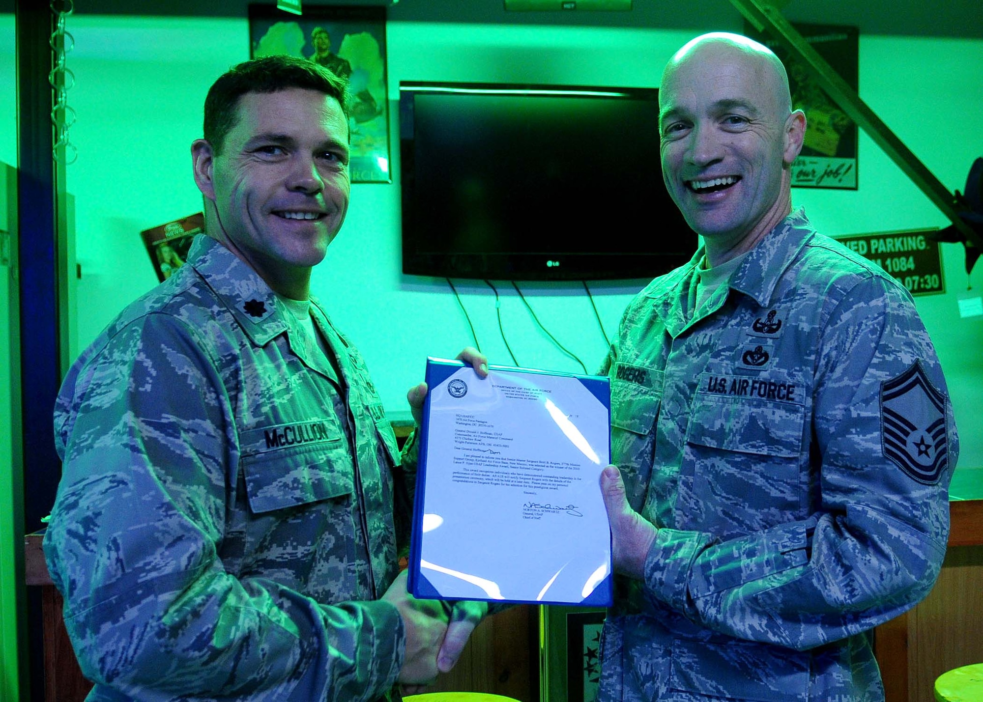 Senior Master Sgt. Brett Rogers, of the 39th Civil Engineer Squadron, is presented the 2010 Lance P. Sijan U.S. Air Force Leadership Award by Lt. Col. Dwayne McCullion, the 39th Civil Engineer Squadron commander. Sergeant Rogers is the winner in the senior enlisted category. This prestigious award recognizes individuals who have demonstrated outstanding leadership in the performance of their duties. (U.S. Air Force photo by Senior Airman Ashley Wood/Released)