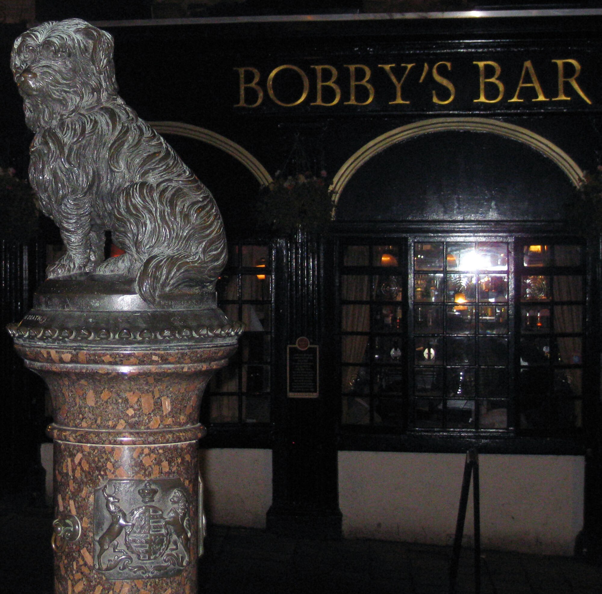 William Brodie sculpted this life-sized statue of Greyfriars Bobby, and it was unveiled without ceremony in November 1873, opposite Greyfriars Kirkyard. It sits at the corner of Edinburgh's Candlemaker Row and George IV Bridge so that Scotland’s capital city will always remember its most famous and faithful dog. (U.S. Air Force photo by Staff Sgt Megan Lyon)
