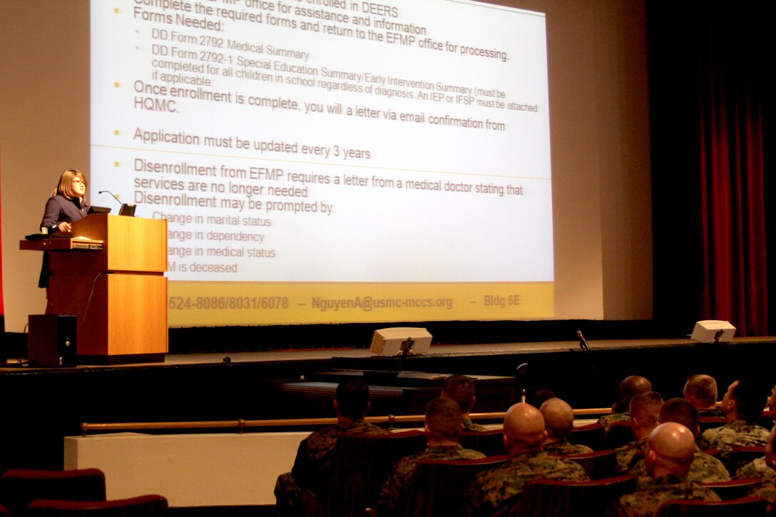 Anna Nguyen, training and education outreach specialist for the Exceptional Family Member Program aboard Marine Corps Recruit Depot San Diego, Calif., briefs the Marines attending Recruiters School at the theatre aboard MCRD San Diego about the EFMP. She said the importance of the program is mission readiness of all service members. She also explained that enrollment in the program can ensure they aren’t sent to a location where their family member can’t receive adequate care.