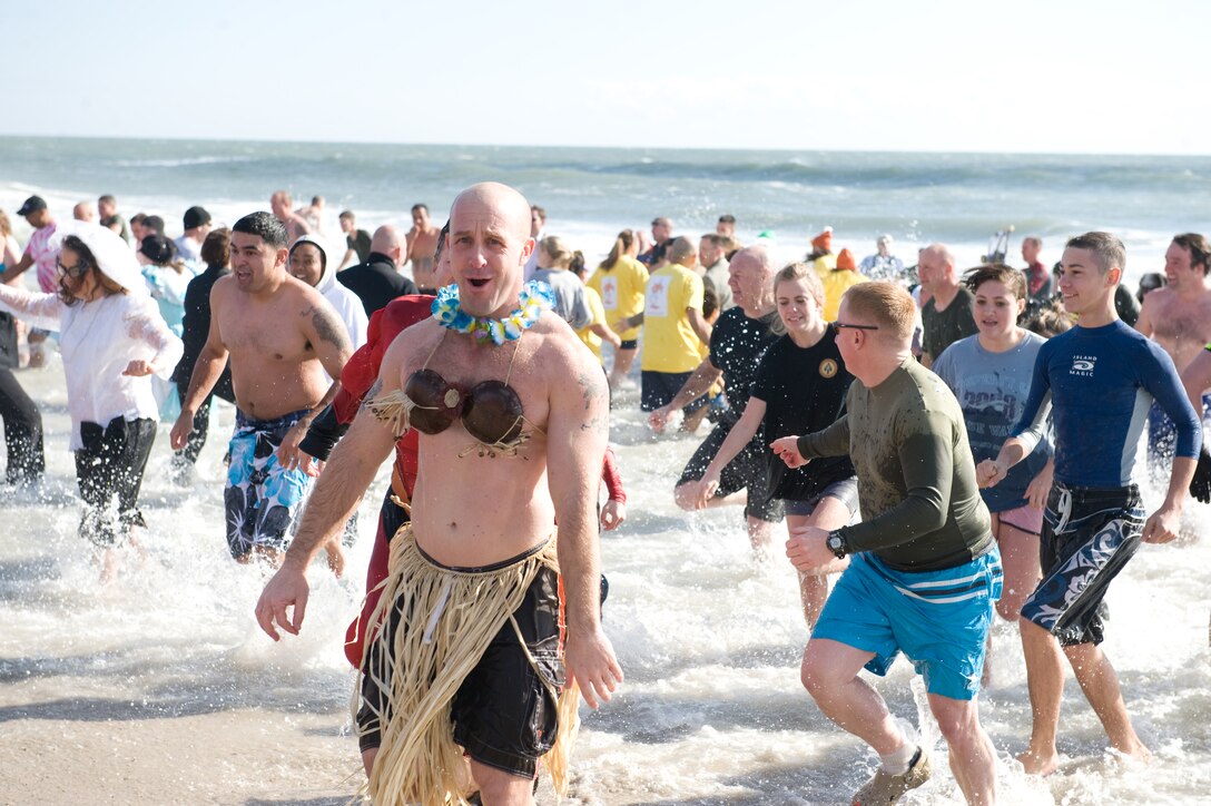 Dressed-up divers have some fun in frigid waves for the annual Special Olympics Polar Plunge fundraiser, Saturday, Jan. 8, 2011.