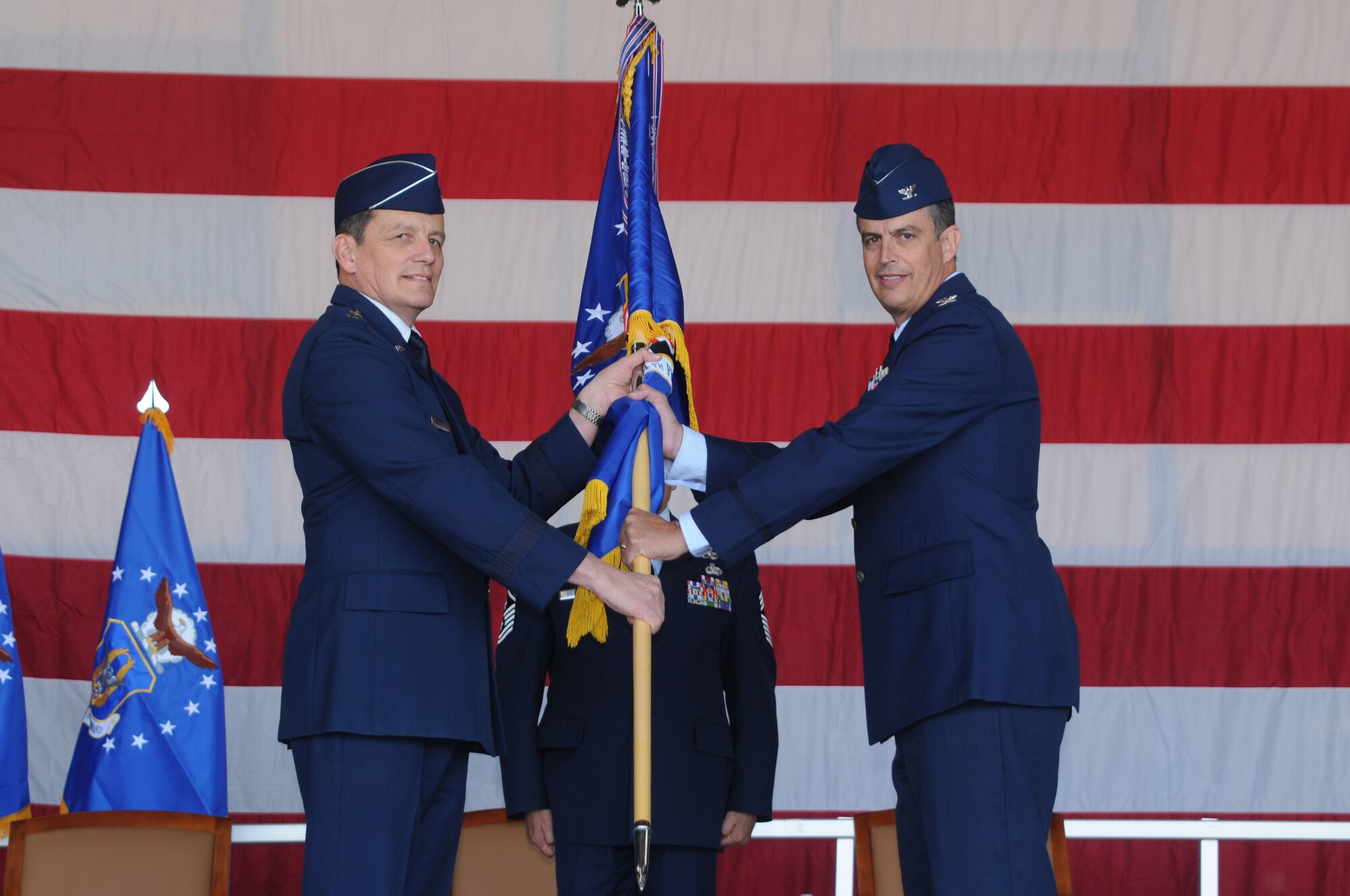 Col. Jose R. Monteagudo accepts command of the 944th Fighter Wing from Maj. Gen. Frank J. Padilla, 10th Air Force commander, Jan. 8, 2011. Colonel Monteagudo's previous assignment was as the Vice Commander, 482nd Fighter Wing, Homestead ARB, Fla. The outgoing commander, Col. Michael Popovich, is now moblization assistant to the Commander, Air Force Space Command, Peterson AFB Colo. (U.S. Air Force photo/Tech. Sgt. Susan Stout) 
