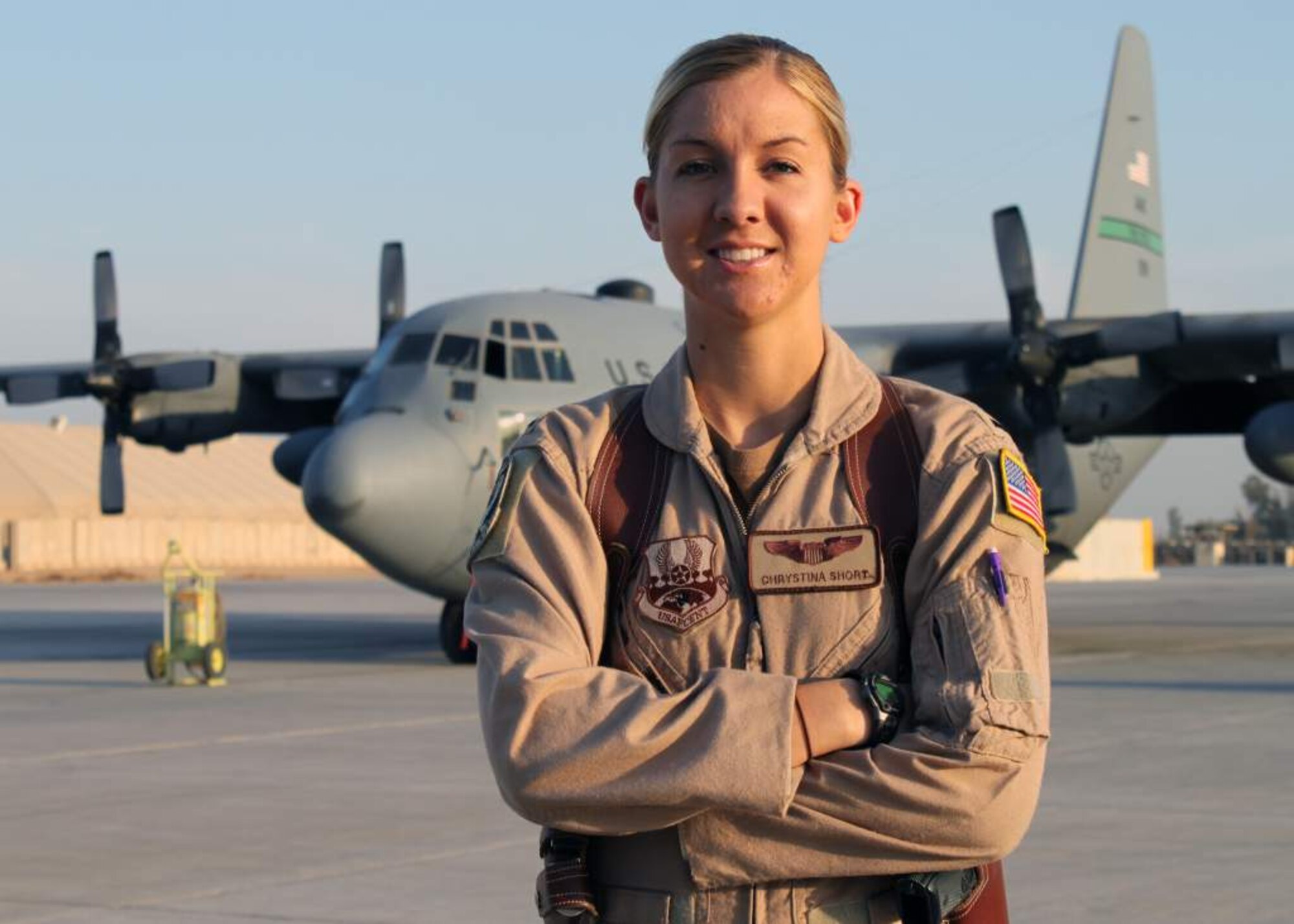 U.S. Air Force 1st Lt. Chrystina Short, 777th Expeditionary Aircraft Squadron C-130 pilot and Horizon East president, poses for a photo in front of a C-130. Horizon East, the Iraq chapter of the non-profit organization Women in Aviation, was started by female pilots deployed to Joint Base Balad, Iraq. The organization is working to inspire, empower and educate the women of Iraq for success in all aviation related careers. (U.S. Air Force courtesy photo)