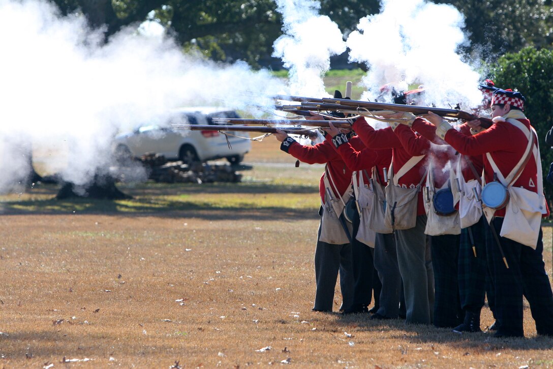 Scottish Highlander role players fire muskets during a demonstration. The Jean Lafitte National Historic Park and Preserve hosted a series of living history events on the Chalmette Battlefield in Chalmette, La., Jan. 7-8 in remembrance of the 1815 Battle of New Orleans.  (Official Marine Corps photo by Cpl. Jad Sleiman)