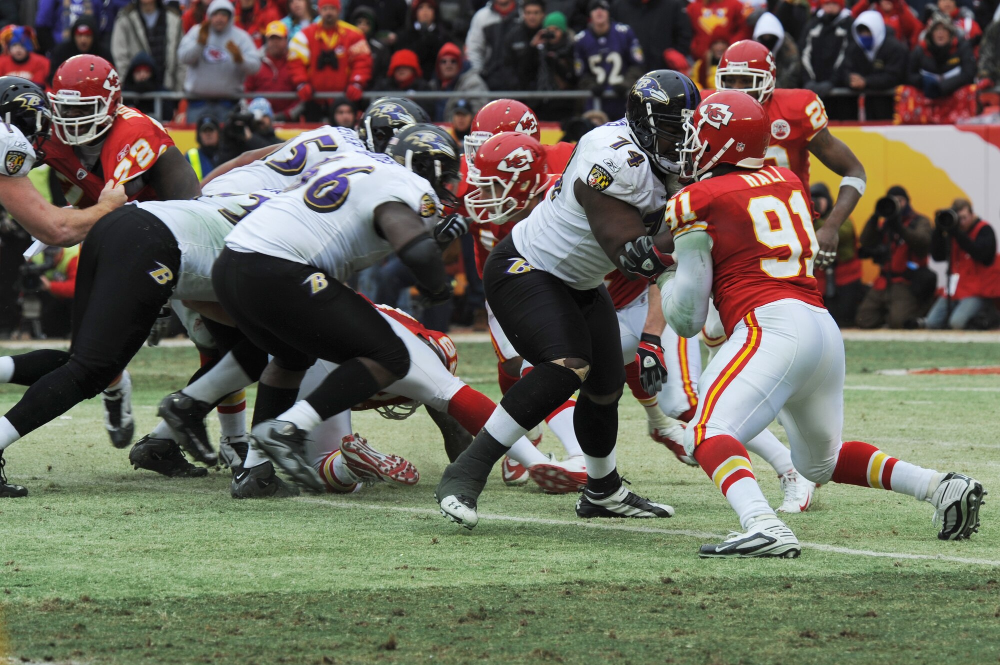 KANSAS CITY, Mo. - Michael Oher, a tight end for the Baltimore Ravens blocks Tamba Hali, a linebacker for the Kansas City Chiefs, during the opening round of the National Football League play-offs Jan 9. (U.S. Air Force photo by Senior Airman Carlin Leslie) 