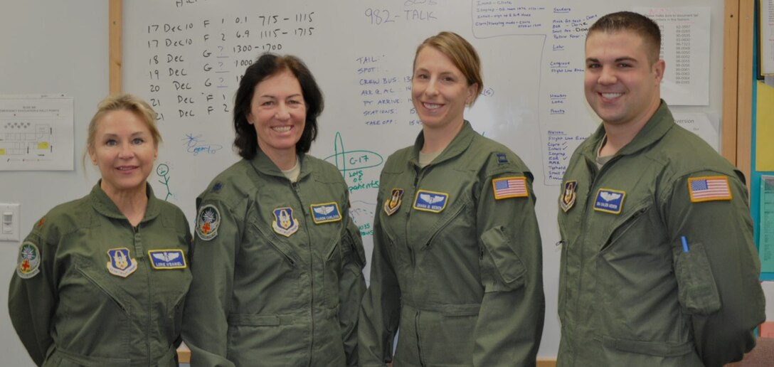 JOINT BASE LEWIS-MCCHORD WASH;Maj. LorieO'Daniel, Lt. Col. Sharron Carlson, Capt. Shana Weber, Senior Airman Caleb Heder. Members for the 446 Aeromedical Evacuation Squadron involved in the production the upcomming IMAX movie Rescue.