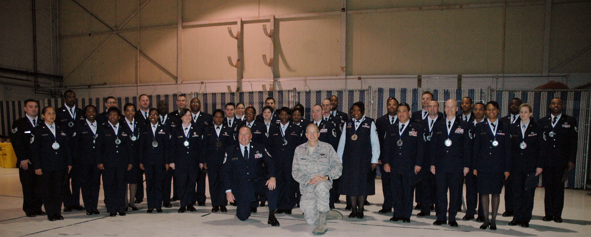 Dobbins Top 3 and 56 group hosted a joing SNCO and NCO induction ceremony here during the Jan. UTA. Col. Tarchick posed with the group at the conclusion of the ceremony. (U.S. Air Force photo/ Senior Airman Danielle Campbell)