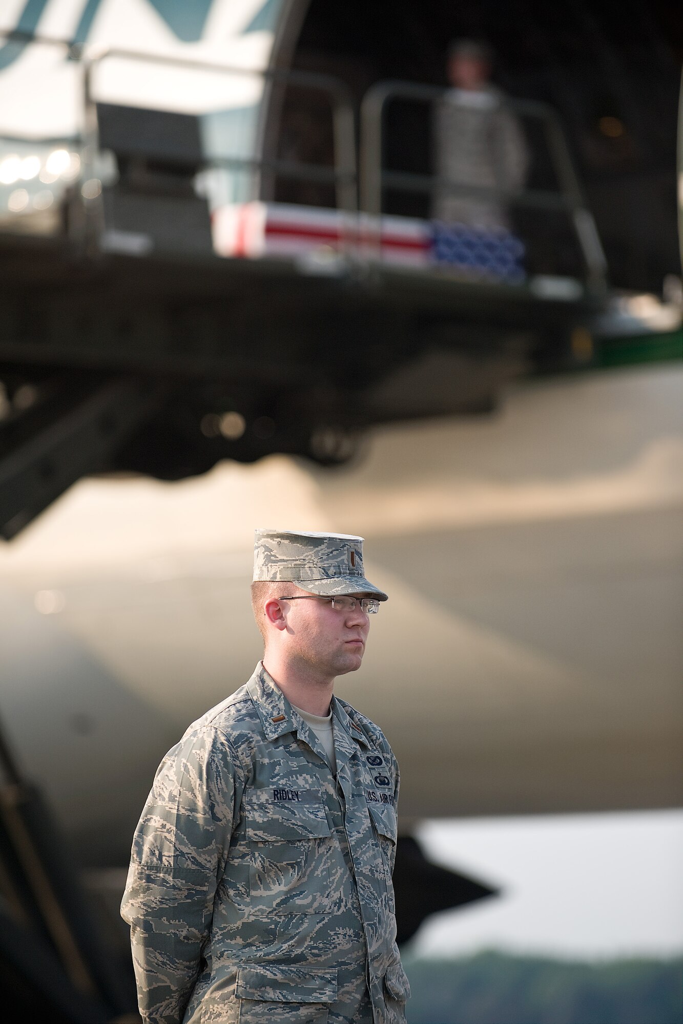 2nd Lt. Rusty Ridley prepares for a dignified transfer of remains mission for a fallen servicemember on the flight line at Dover AFB, Del. (U.S. Air Force photo/Roland Balik)