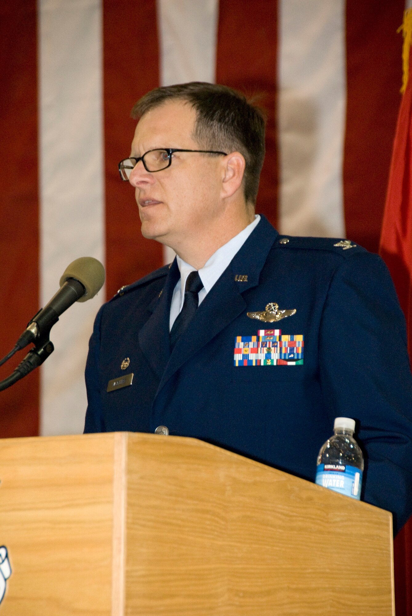 Col. Michael McGuire, the new 162nd Fighter Wing commander, addresses the wing and guests at the assumption of command ceremony Jan. 8. (U.S. Air Force photo/Master Sgt. Dave Neve)