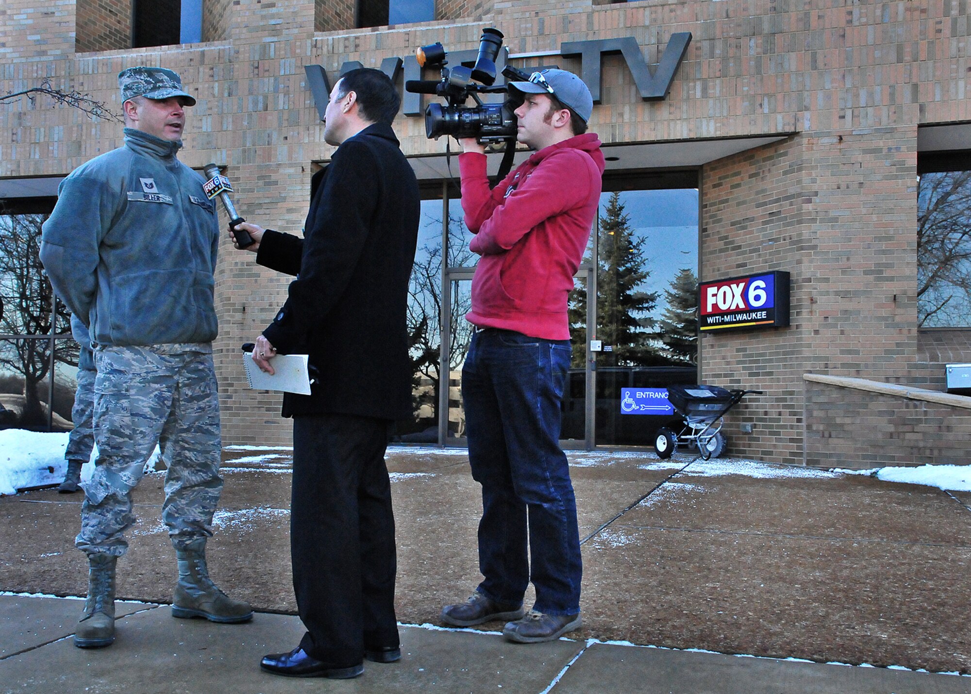 Milwaukee Air Guardsman Tech. Sgt. Chance Biller is interviewed by Fox 6 Milwaukee Meteorologist Vince Condella Friday, 10 Dec. 2010.

Biller and Condella teamed up to collect winter coats to donate to the Salvation Army. 
