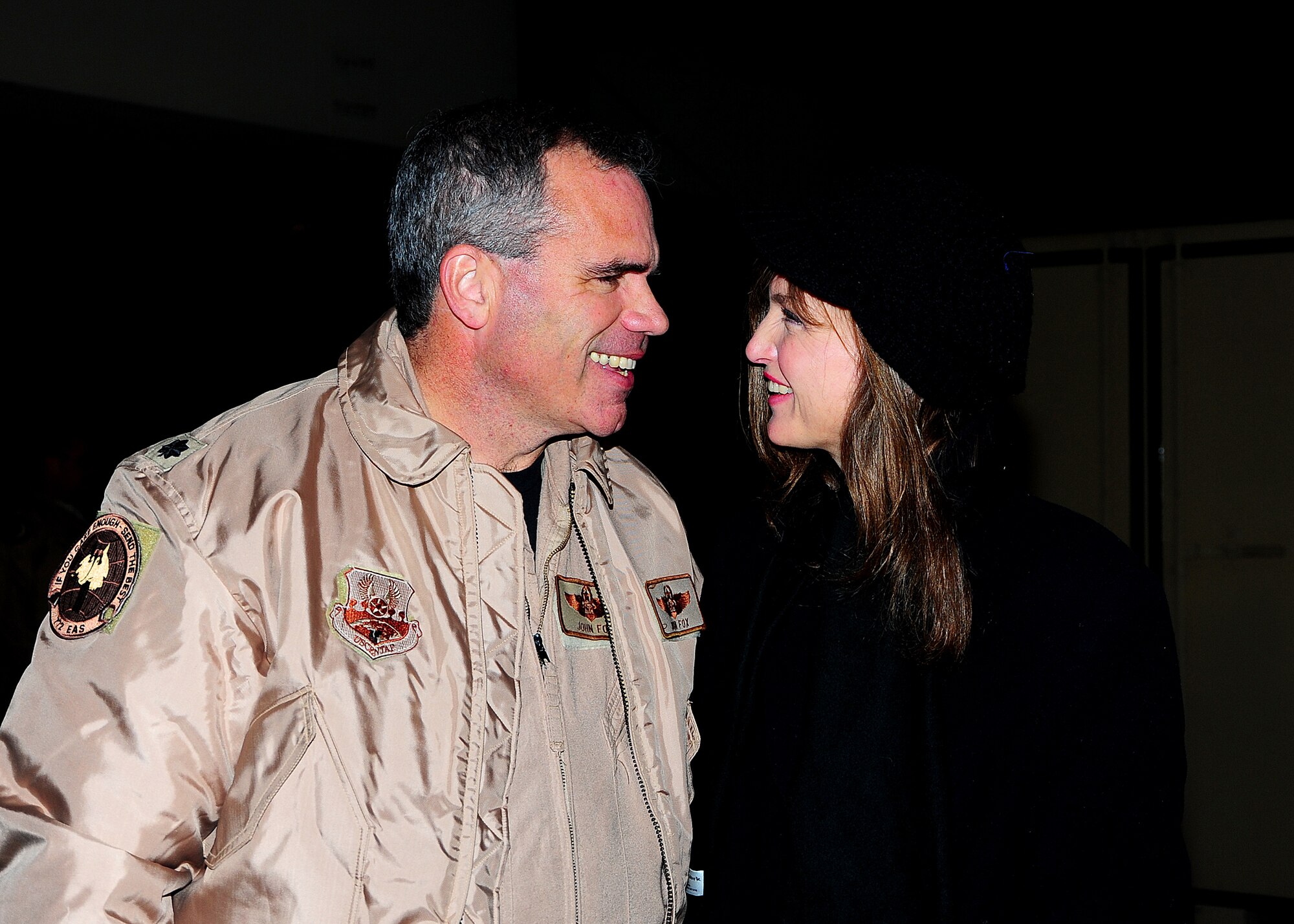 Lt. Col. John Fox, 815th AS assistant director of operations, and Anne Baxter share a funny moment on Jan. 08, before he deploys.  Reservists with the 403rd Maintenance Group and 815th AS and active-duty members from the 345th AS deployed for 120 days in support of overseas contingency operations in Southwest Asia. The 815th "Flying Jennies" and 345th "Golden Eagles," an active associate unit, work and train side-by-side as part of the 403rd Wing at Keesler Air Force Base, Miss.  (U.S. Air Force photo by Staff Sgt. Yolanda Addison)
