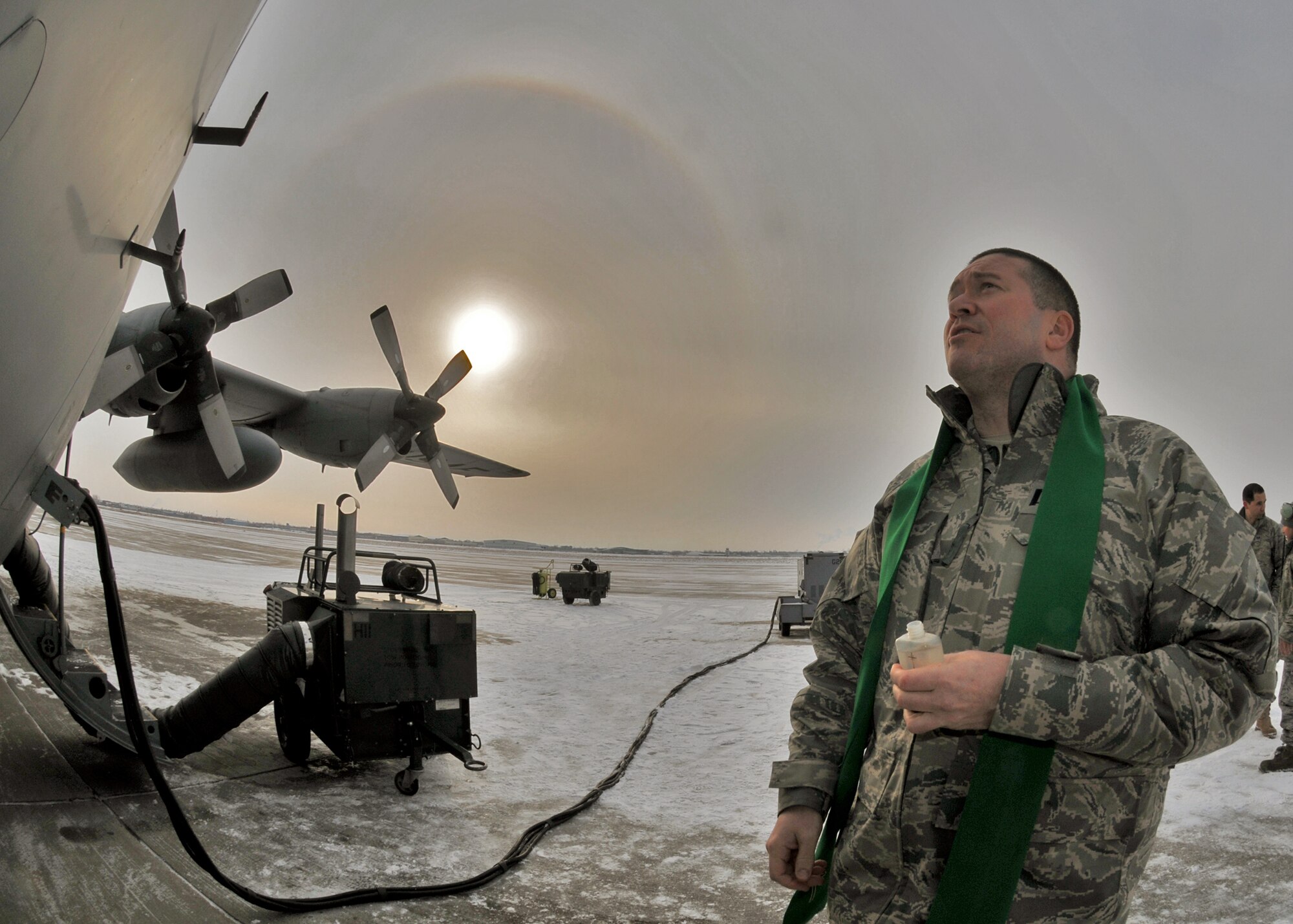 914th Airlift Wing Chaplain (Capt.) James Bastian blesses aircraft on the flightline January 8, 2011 Niagara Falls Air Reserve Station, Niagara Falls, NY. Chaplain Bastion blesses the aircraft and crew before they begin their mission delivering supplies to an undisclosed location in south west Asia. (U.S. Air Force photo by Staff Sgt. Joseph McKee)
