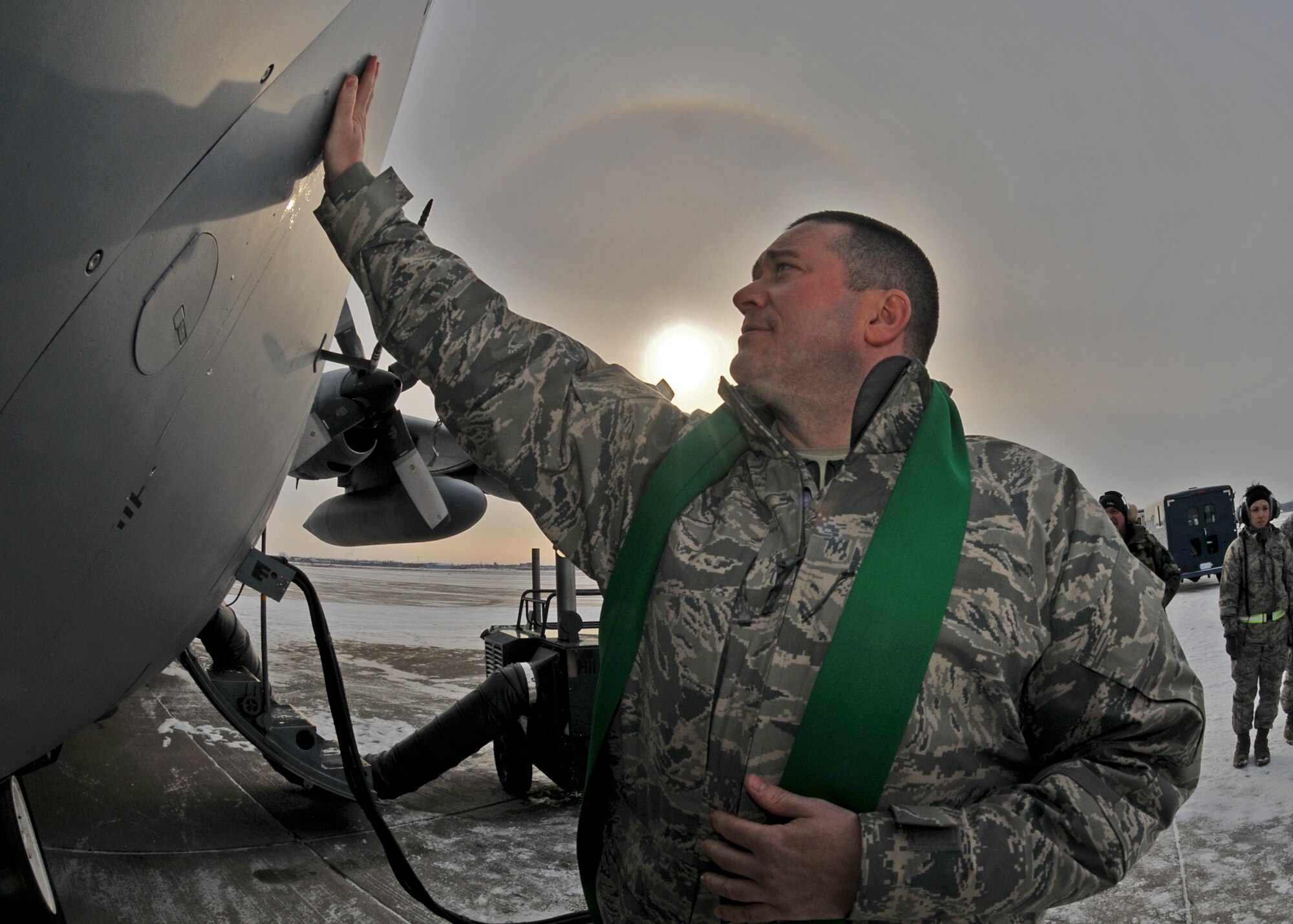 914th Airlift Wing Chaplain (Capt.) James Bastian blesses aircraft on the flightline January 8, 2011 Niagara Falls Air Reserve Station, Niagara Falls, NY. Chaplain Bastion blesses the aircraft and crew before they begin their mission delivering supplies to an undisclosed location in south west Asia. (U.S. Air Force photo by Staff Sgt. Joseph McKee)