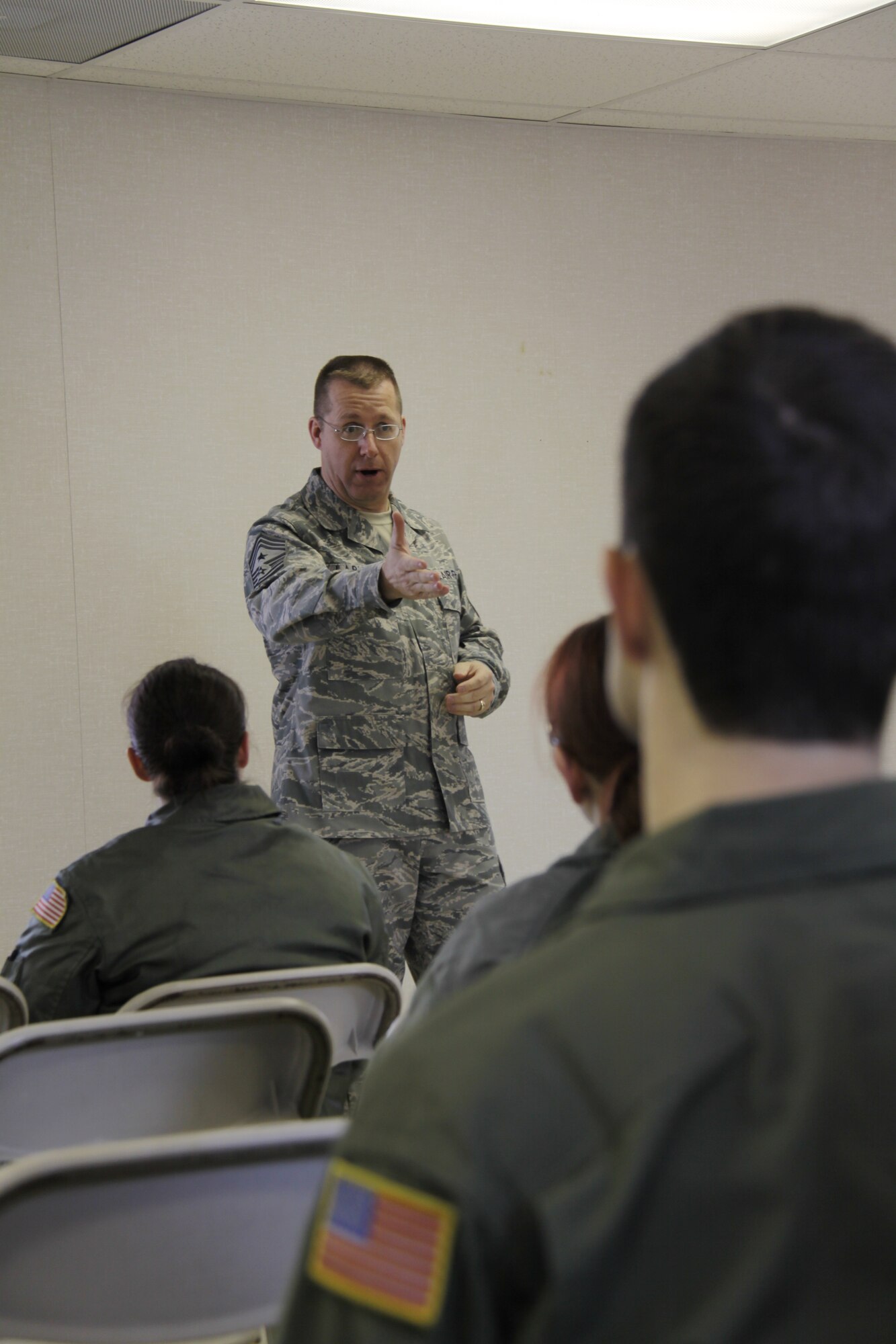 Chief Master Sgt. Steven Larwood, 22nd Air Force command chief, talks to members of the 911th Aeromedical Evacuation Squadron, Jan 8. Chief Larwood visited the base to stress the important role that reservists play in accomplishing the Air Force’s overall mission and the importance of career advancement. (U.S. Air Force photo/Senior Airman Joshua J. Seybert)