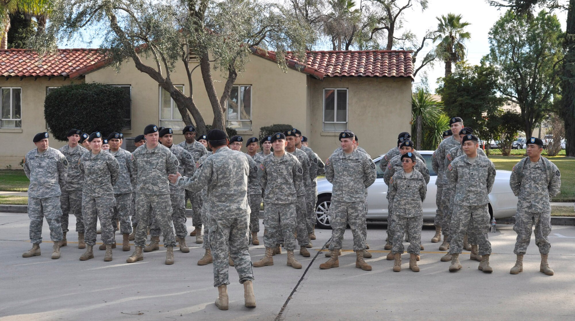 The Soldiers of the 7230th Medical Support Unit rehearse for their deployment ceremony at the Hap Arnold Club Jan. 5, 2011, at March Air Reserve Base, Calif.  The southern California Army reservists, who are based at the Armed Forces Reserve Center adjacent to the base, will deploy for a year to support medical screenings for the Soldier Readiness Program at Joint Base Lewis-McChord, Wash.    (U.S. Air Force photo/Megan Just)