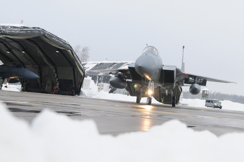 An F-15C Eagle from the 493rd Expeditionary Fighter Squadron taxis before flying to its home station of Royal Air Force Lakenheath, England, upon finishing a rotation of NATO's Baltic air policing mission. The 493rd EFS assumed command of the mission from the Polish Sept. 1, 2010 and relinquished it to the German air force Jan. 5, 2011. (U.S. Air Force photo/Staff Sgt. Stephen Linch) 