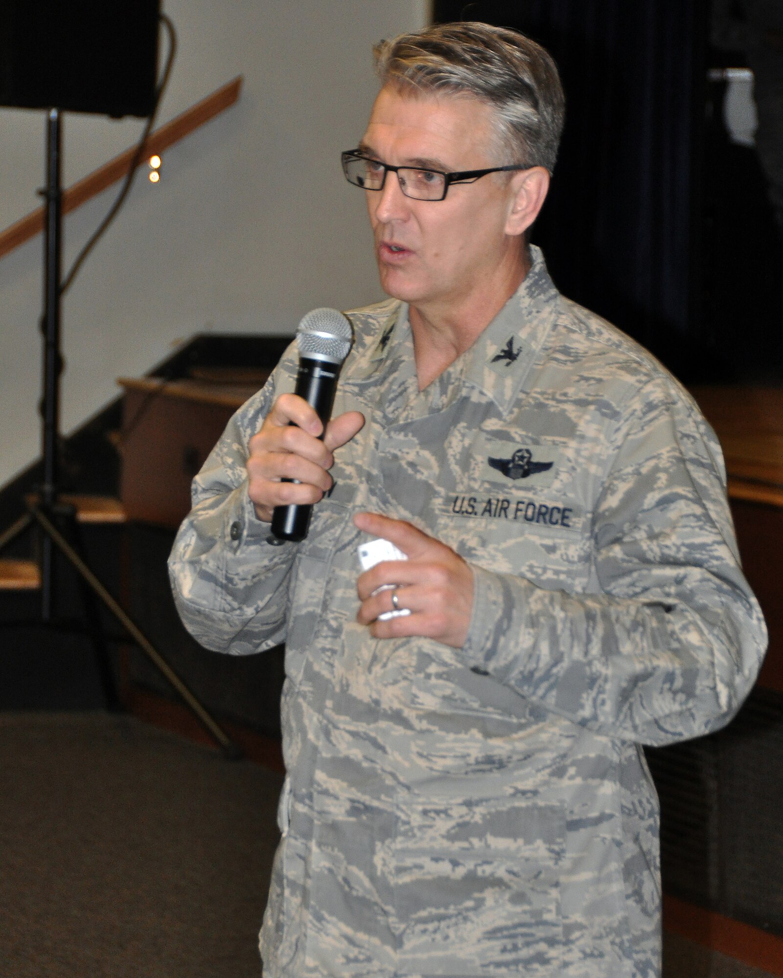 JOINT BASE MCGUIRE-DIX-LAKEHURST, NJ ? Colonel Giordano McMullen, 514th Air Mobility Wing commander, addresses the wing during a commander's call at the McGuire Community Center here Jan. 9, 2011. Colonel McMullen encouraged his Airmen to carefully prepare for an upcoming unit compliance inspection. (U.S. Air Force photo/Tech. Sgt. Shawn J. Jones)