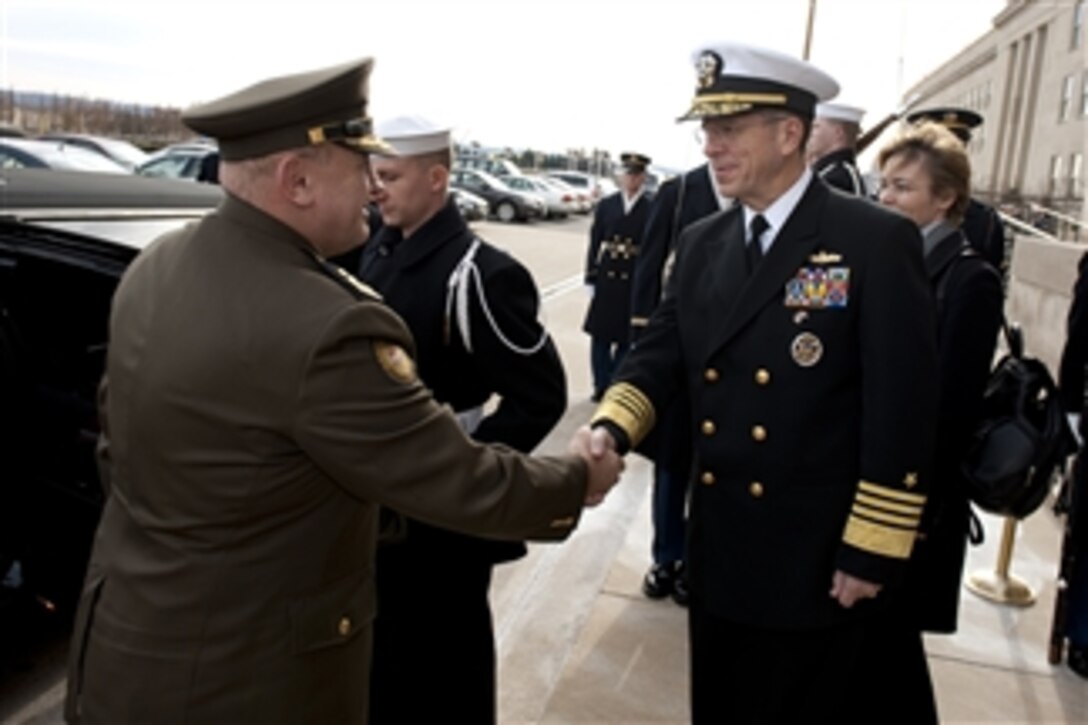Chairman of the Joint Chiefs of Staff Adm. Mike Mullen, U.S. Navy, welcomes Croatian Chief of Defense Gen. Josip Lucic to the Pentagon on Jan. 10, 2011.  