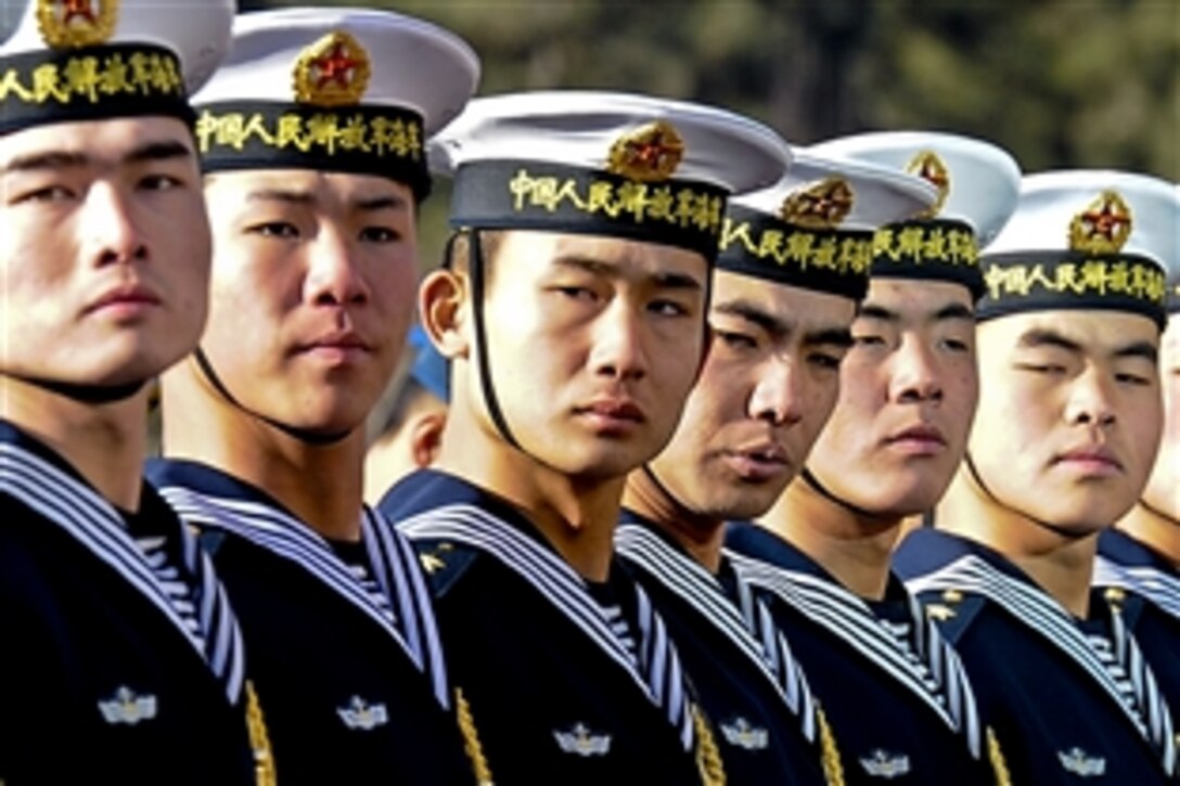 Chinese soldiers of the People's Liberation Army prepare for an honors ceremony for U.S. Defense Secretary Robert M. Gates as he arrives at the Bayi building in Beijing, Jan. 10, 2011. Gates met with Chinese Defense Minister Liang Guanglie and his staff at the ministry and held a press conference there.