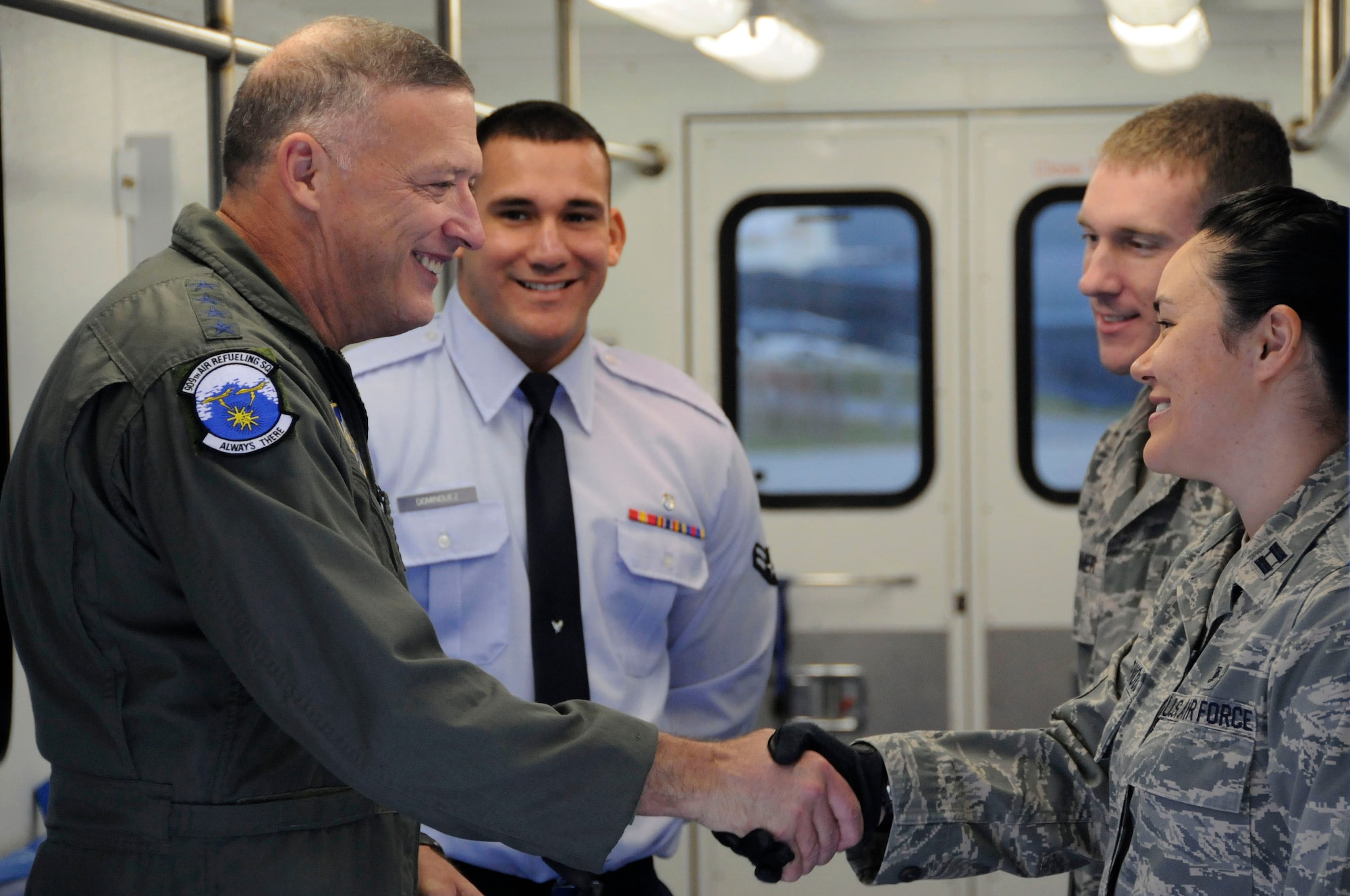 Gen. Gary North, Pacific Air Forces commander, greets members from the 18th Aeromedical Evacuation Squadron during his visit to Kadena Air Base Jan. 10. 18th Wing members had the chance to meet the PACAF commander and show him how they support Kadena Air Base. (U.S. Air Force photo/Staff Sgt. Darnell T. Cannady)