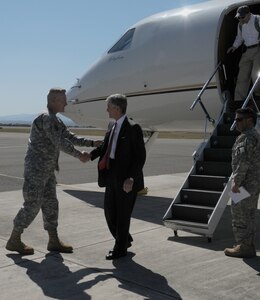 SOTO CANO AIR BASE, Honduras - Colonel Gregory Reilly (left), Joint Task Force-Bravo commander, greets The Honorable John McHugh, Secretary of the Army, upon his arrival to Soto Cano Air Base, Jan. 10. During his two-day visit to Joint Task Force-Bravo, Secretary McHugh visited with military members base-wide and held an open forum for soldiers to voice their concerns. (U.S. Air Force photo/Staff Sgt. Kimberly Rae Moore)