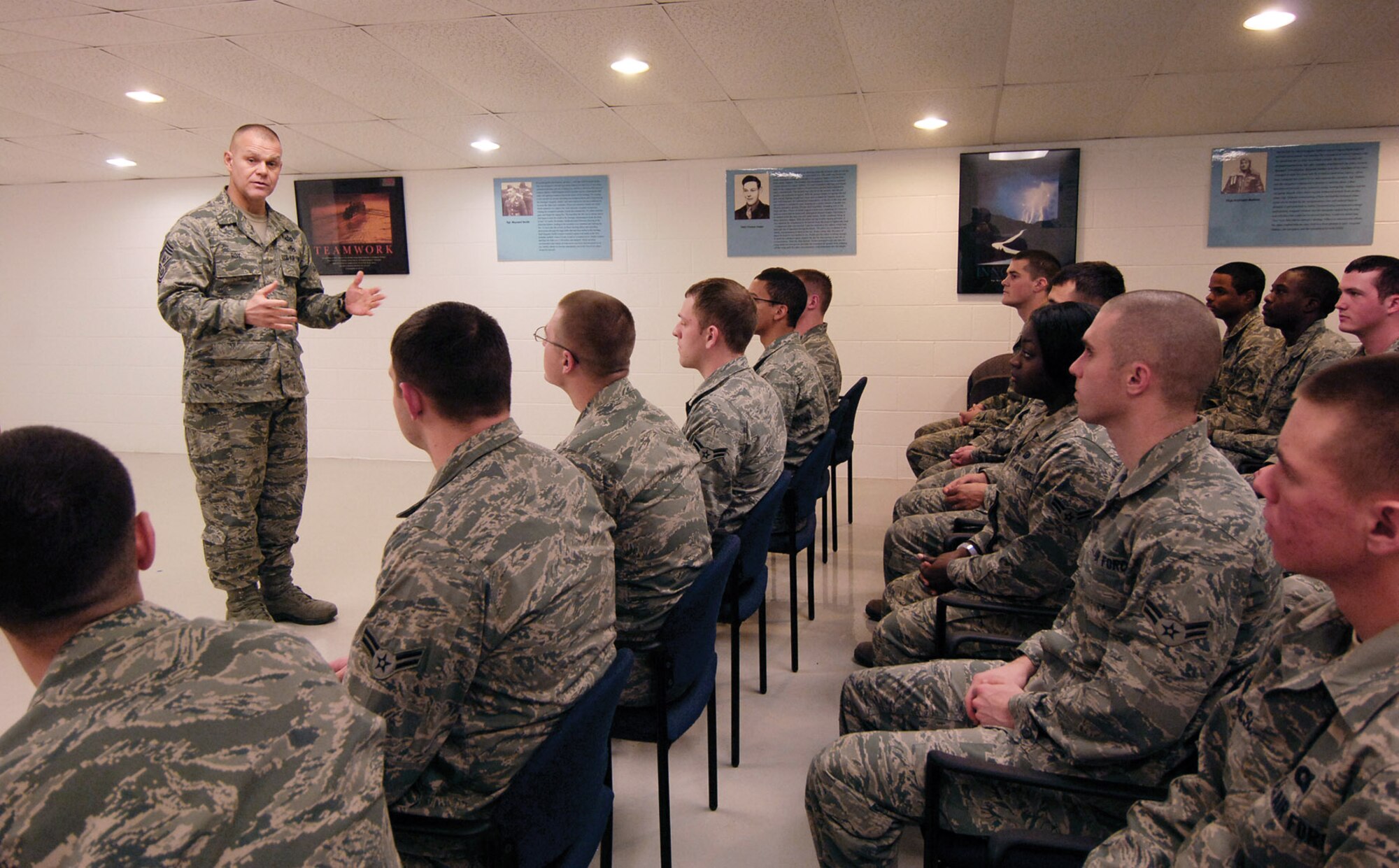 During his Jan. 5 and 6 visit to Tinker, Chief Master Sgt. of the Air Force James A. Roy talks with 23 Airmen attending Tinker’s First Term Airmen Center.   The chief touched on the Air Force’s future and the importance of training before thanking them for their service and then inviting questions.  FTAC is a five-day course that helps Airmen transition from a training to a mission-oriented environment. (Air Force photo by Margo Wright)