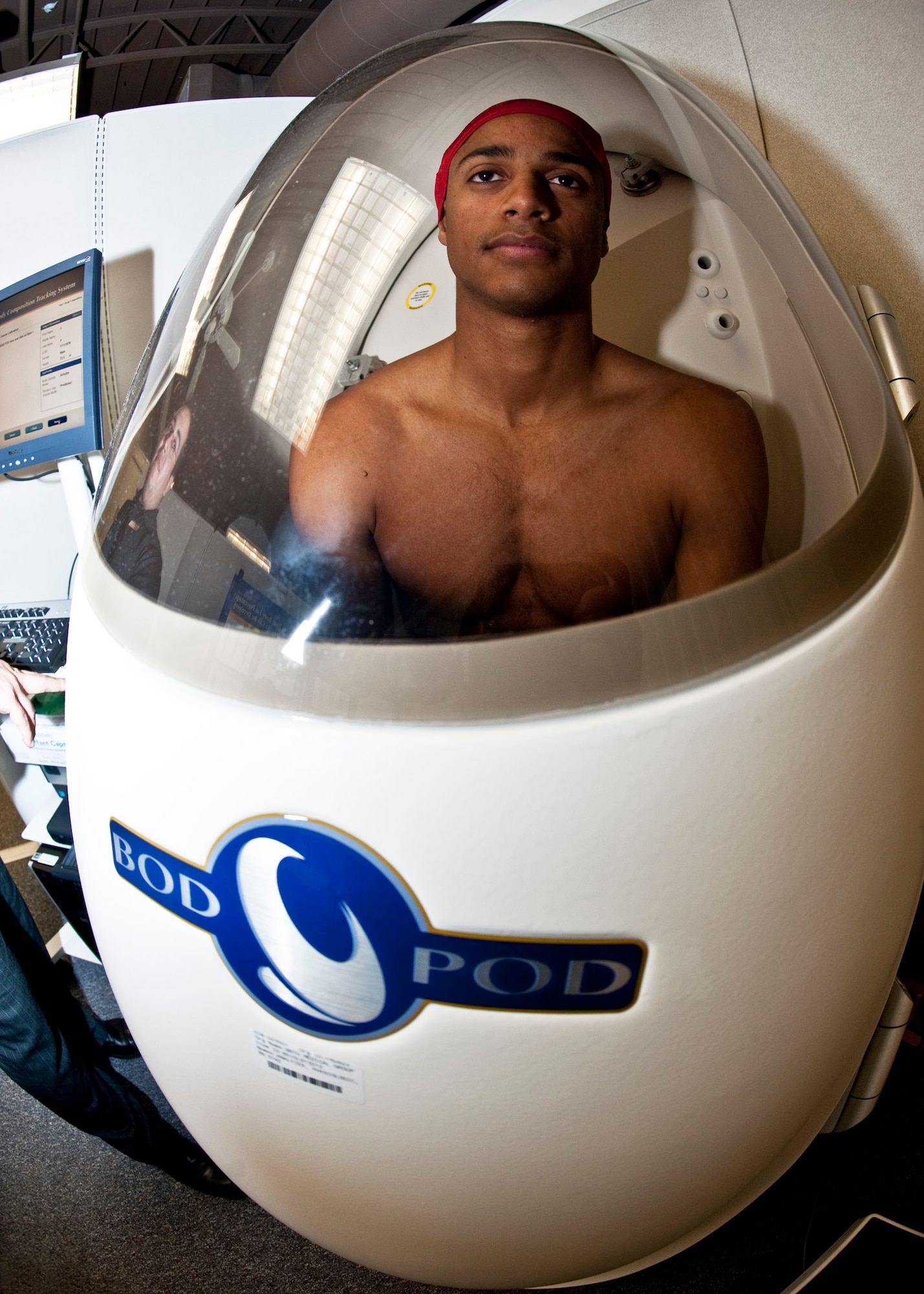 Senior Airman Sydney Sullivan, 96th Force Support Squadron, sits inside the “Bod Pod,” a system that determines a person’s body composition at the Eglin Health and Wellness Center, Jan. 11.  The pod and other new features will be on display during the HAWC’s open house, Jan. 20.  (U.S. Air Force photo/Samuel King Jr.)