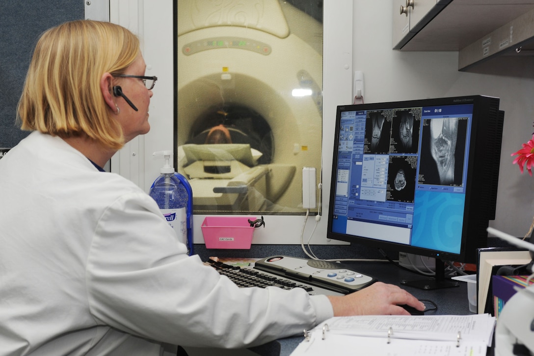 LANGLEY AIR FORCE BASE, Va. – Belinda Sandifer, senior magnetic resonance imaging technician, reviews MRI scans Jan. 6 at the 633d Medical Group Radiology Department MRI trailer. With the addition of the MRI trailer, contracted with Alliance Imaging, patients can expect fewer delays in scheduling, appointment lengths and follow-up treatment. (U.S. Air Force photo/Senior Airman Brian Ybarbo)