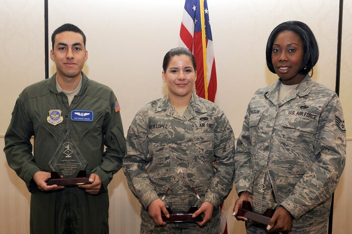 Staff Sgt. Manuel Chacon, left, Airman 1st Class Sebastiana Solis Lopez, center and SSgt Veronica Garrison were recognized as January's Diamond Sharp winners Jan. 11, 2011 at the Charleston Club. Airmen are chosen by their respective First Sergeants and recognized during an official ceremony on the first Tuesday of every month. Sergeant Chacon is with the 15th Airlift Squadron, Airman Solis Lopez is with the 437th Aircraft Maintenance Squadron and Sergeant Garrison is with the 437th Aerial Port Squadron. (U.S. Air Force photo/Staff Sgt. Marie Brown)