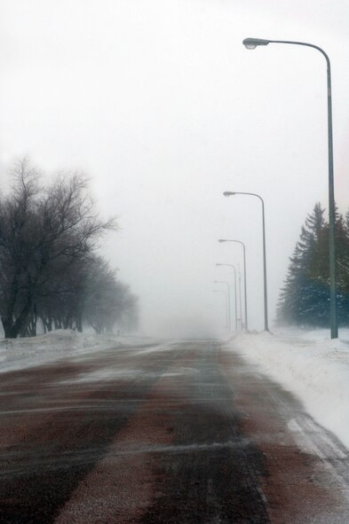 MINOT AIR FORCE BASE, N.D., Snow snakes are fine wisps of snow that blow across the roads and parking lots. They are a common cause of slips and falls in the winter here. (U.S. Air Force Photo/Airman 1st Class Aaron Wainwright)