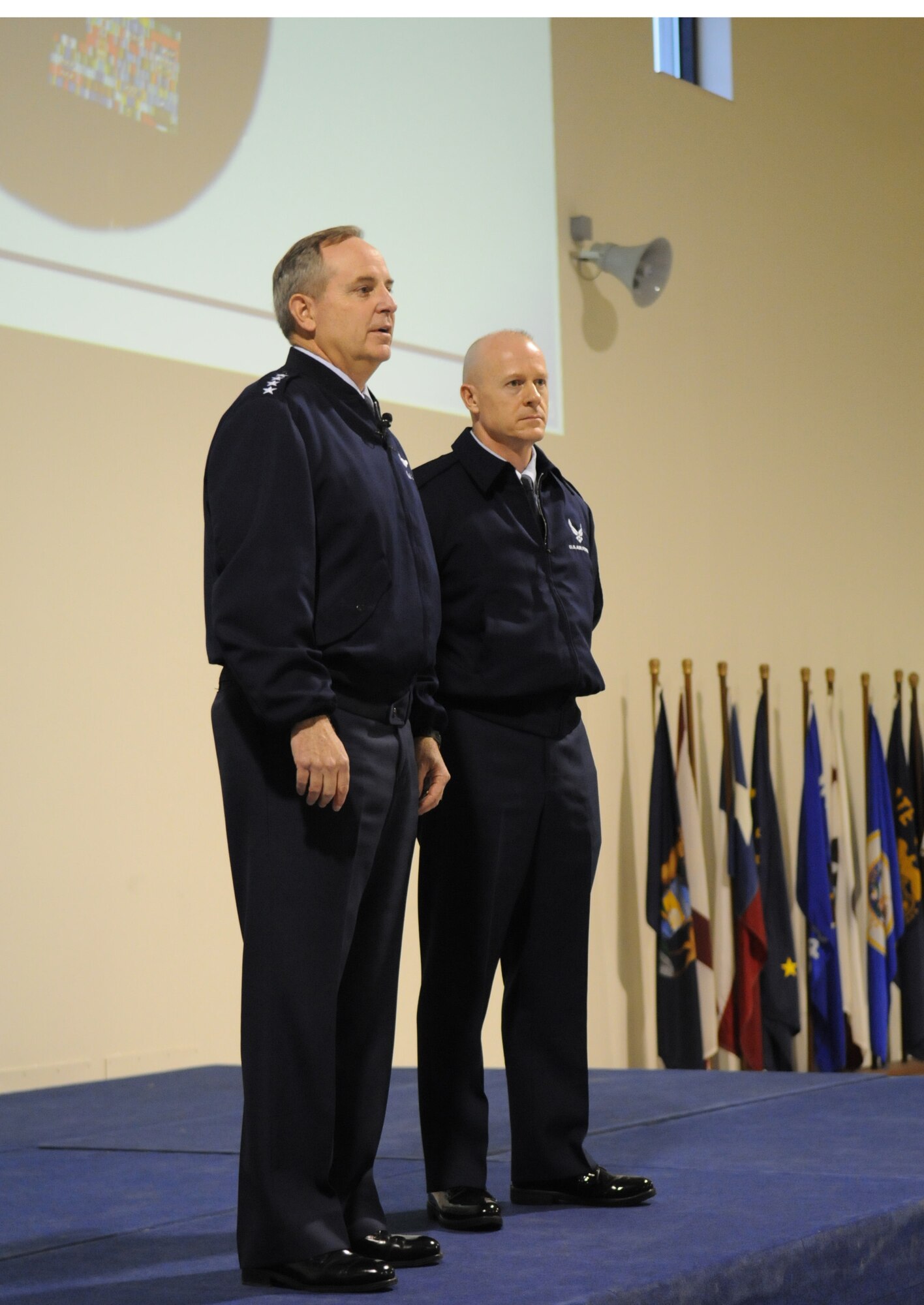 Gen. Mark A. Welsh III, U.S. Air Forces in Europe commander, and Chief Master Sgt. David Williamson, USAFE command chief,  address Aviano Airmen during a commander's call at Aviano Air Base, Italy, Jan. 10. This is General Welsh's first official visit to a USAFE wing since his assumption of command. (U.S. Air Force photo/ Staff Sgt. Nadine Y. Barclay)