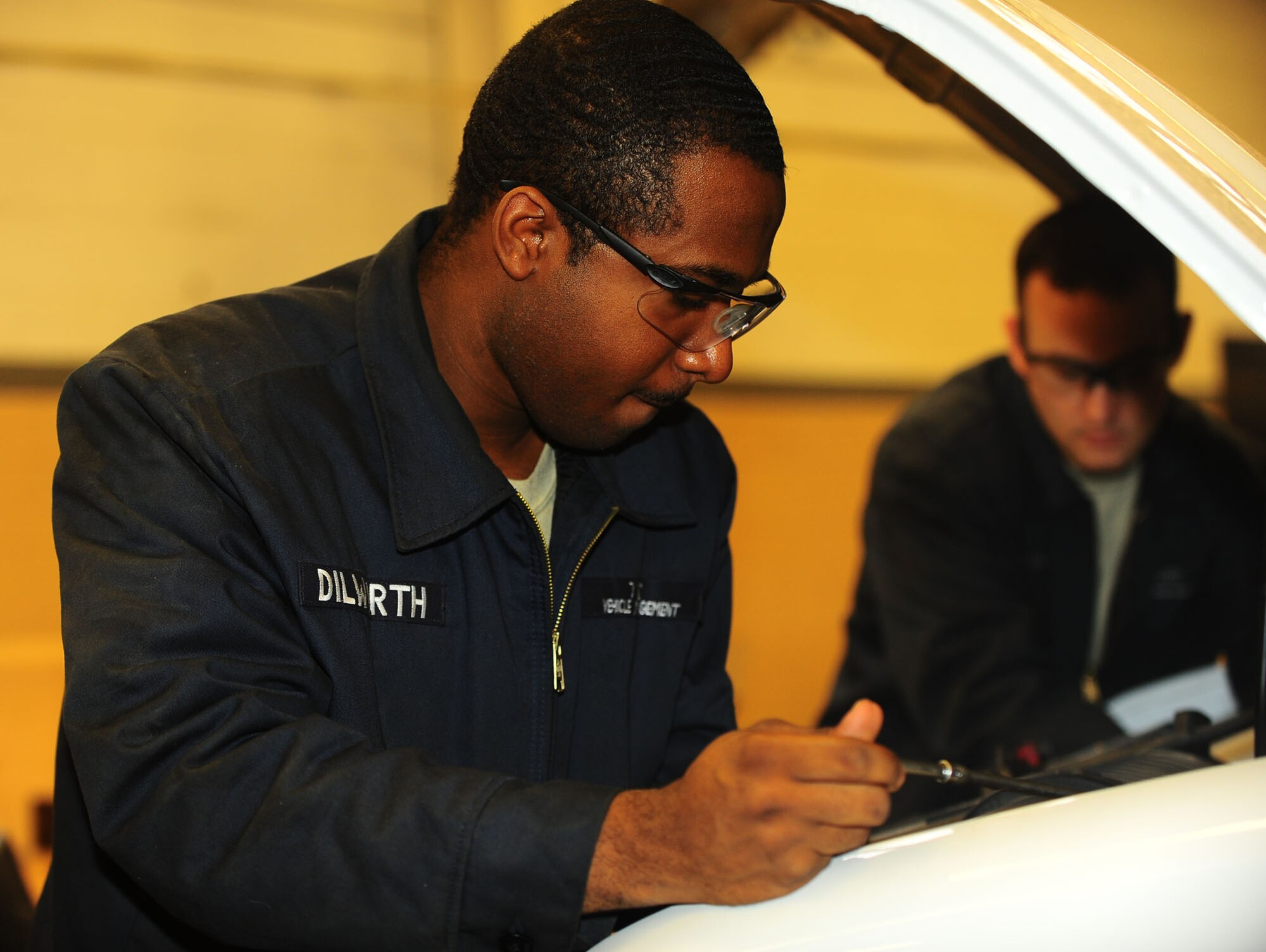 DYESS AIR FORCE BASE, Texas—Senior Airman Michael Dilworth, 7th Logistics Readiness Squadron, works on a vehicle for training purposes here, Jan. 10.  The squadron is responsible for home base logistics support as well as mobility support of deployed forces.  The squadron provides supplies, equipment and fuel to all base units; and receives and stores more than 388,000 pieces of property, valued at over $211 million. They fulfill the base’s transportation requirements; manage and maintain 588 vehicles; operate the base taxi fleet, aircrew transportation and personal property shipments; and recall and train ready-augmentation-duty force personnel to support deployment exercises, inspections and contingencies. (Air Force photo/ Airman First Class Courtney Moses)