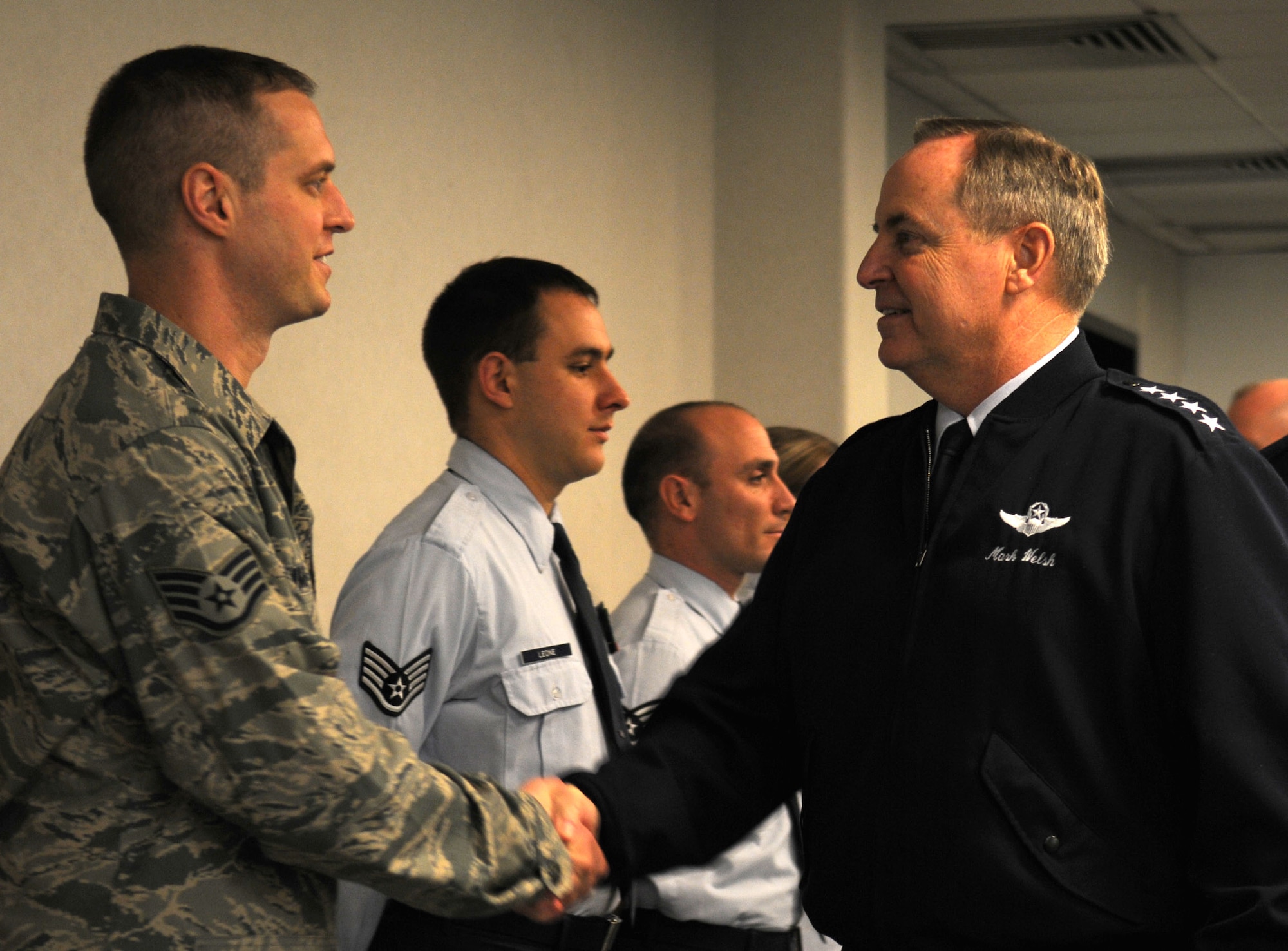 Gen. Mark A. Welsh III, U.S. Air Forces in Europe commander, greets Aviano Airmen during his visit to Aviano Air Base, Italy, Jan. 10-11. This was General Welsh's first official visit to a USAFE wing since his assumption of command. (U.S. Air Force photo/ Staff Sgt. Nadine Y. Barclay)