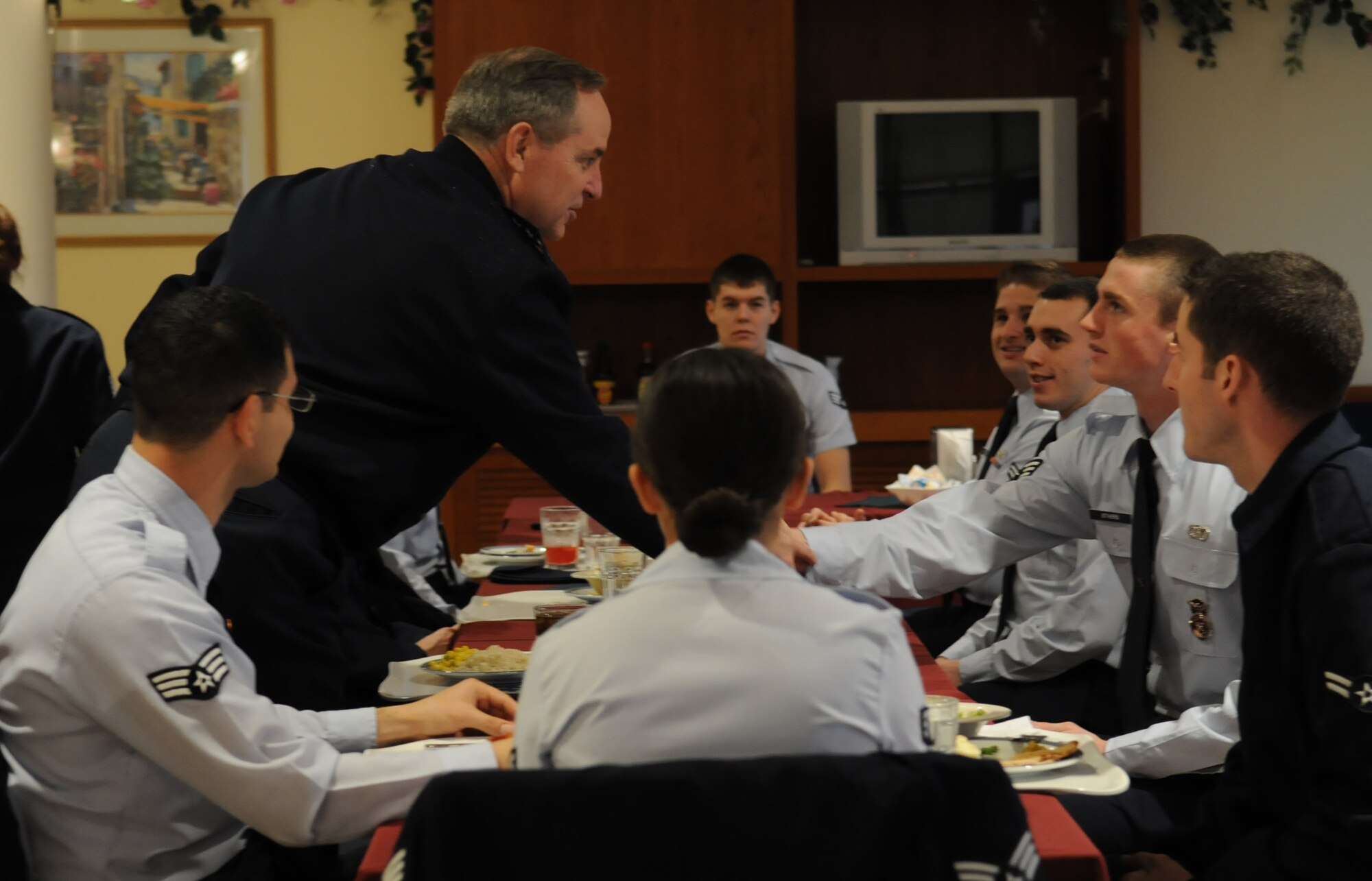 Gen. Mark A. Welsh III, U.S. Air Forces in Europe commander, greets Aviano Airmen during his visit to Aviano Air Base, Italy, Jan. 10-11. This was General Welsh's first official visit to a USAFE wing since his assumption of command. (U.S. Air Force photo/ Staff Sgt. Nadine Y. Barclay)