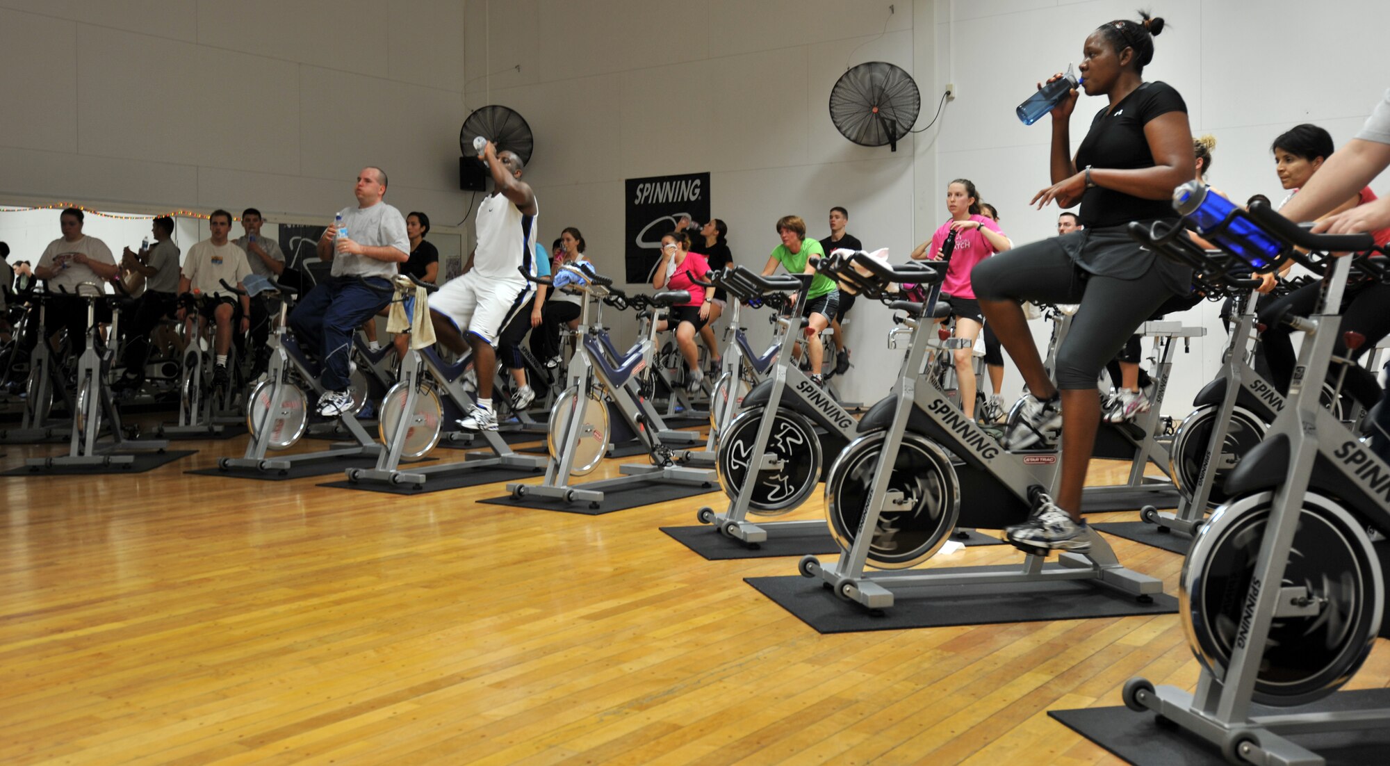 Approximately 800 members of the Misawa Air Base community came together at the Potter Fitness Center Jan. 8, 2011, to participate in the Step into the New Year Aerobathon. The aerobathon consisted six classes spread over a four-hour period. The classes were step aerobics; Zumba and hip hop dance, kickboxing, boot camp, yoga and spin.  (Air Force photo by Airman James Bauer/Released)