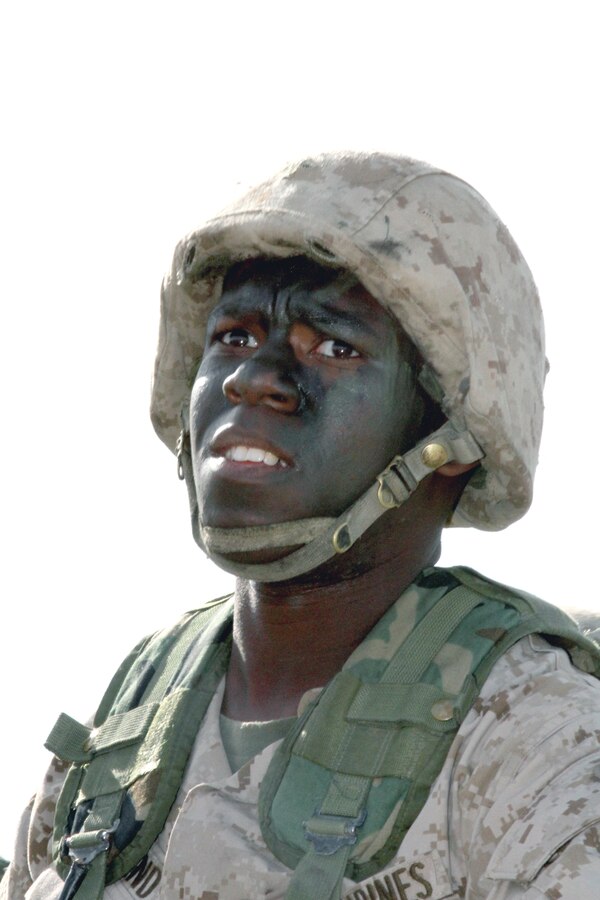 Recruit Murad F. Eiland, Platoon 1034, Company B, confronts another task he and his teammates must complete during the Crucible. Becoming a Maine has been Eiland’s goal since the death of his mother in 2009.