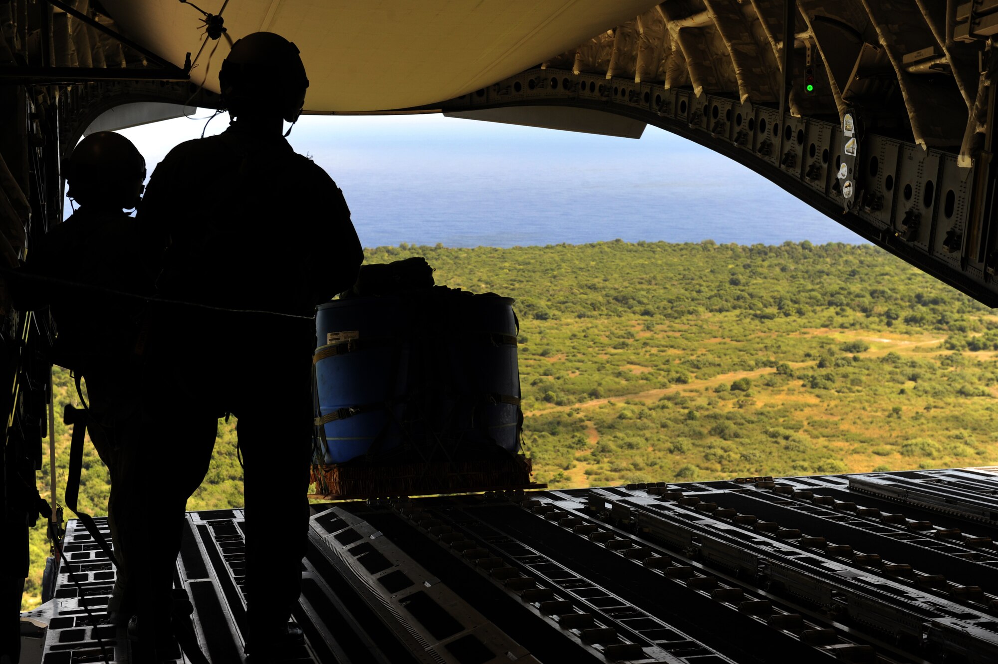 Aircrews from the 535th AS dropped nine training pallets during a single day Jan. 11, 2011 while on temporary assignment to Andersen Air Base, Guam. The aircrew then helped the 36th Contingency Response Group with static line jump training. (U.S. Air Force photo/Staff Sgt. Mike Meares)