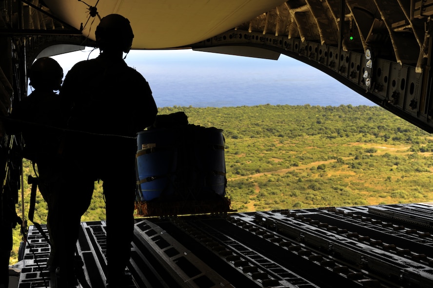 Aircrews from the 535th AS dropped nine training pallets during a single day Jan. 11, 2011 while on temporary assignment to Andersen Air Base, Guam. The aircrew then helped the 36th Contingency Response Group with static line jump training. (U.S. Air Force photo/Staff Sgt. Mike Meares)