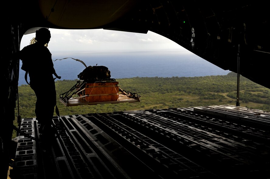 Aircrews from the 535th AS dropped nine training pallets during a single day Jan. 11, 2011 while on temporary assignment to Andersen Air Base, Guam. The aircrew then helped the 36th Contingency Response Group with static line jump training. (U.S. Air Force photo/Staff Sgt. Mike Meares)