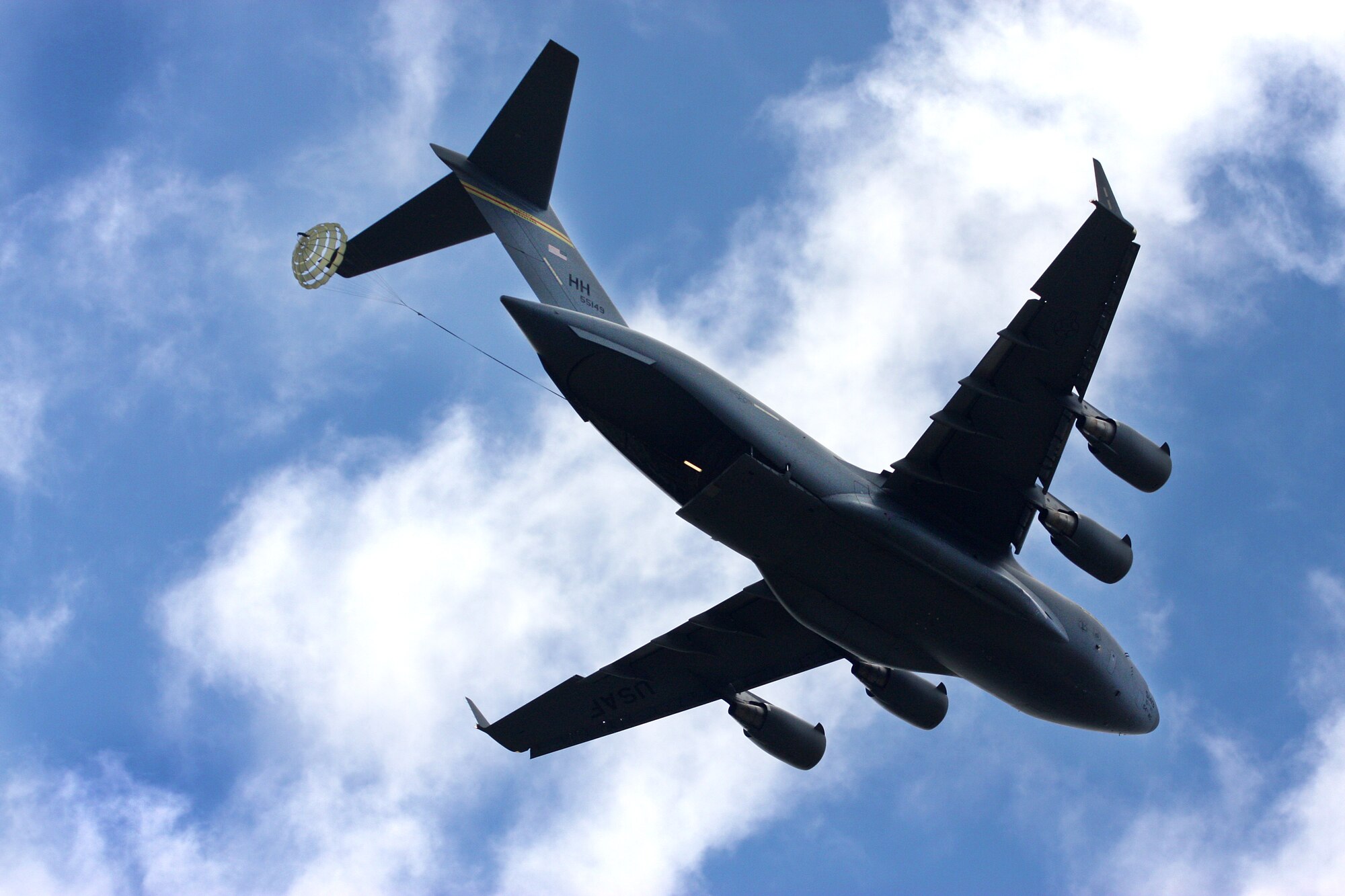 Aircrews from the 535th Airlift Squadron dropped nine training pallets during a single day of training while on a temporary assignment to Andersen Air Base Guam. The aircrew then helped the 36th Contingency Response Group with static line jump training. (U.S. Air Force photo/Capt. Dave Monaco)