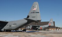 Two C-130 Hercules were on display during the Air Force Reserve Command Special Missions Conference at Peterson Air Force Base, Colo., Jan. 12-13. Airmen and aircraft from the 302nd Airlift Wing here, the 403rd Wing, Keesler Air Force Base, Miss., and the 910th Airlift Wing, Youngstown Air Reserve Base, Ohio, convened at Peterson AFB to share lessons learned, policies and procedures and tackle common support and wing issues. (U.S. Air Force photo/Capt. Marnee A.C. Losurdo)