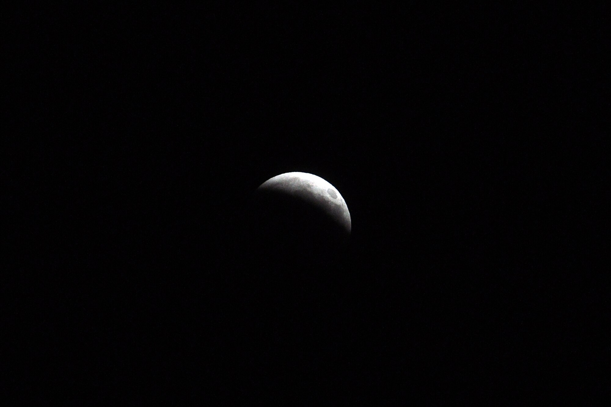 By 10:25 most of the moon was covered by the earth's shadow. (U.S. Air Force photo/John Pennell)