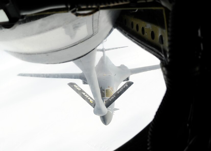 B-1 Bomber receives fuel from a KC-135 Stratotanker, over northern Montana, Jan 06, 2011. The task was a mid-flight refueling mission, which was also an incentive flight for the honorary commanders aboard to witness the mission firsthand. (U.S. Air Force Photo/Airman 1st Class Taylor Curry)