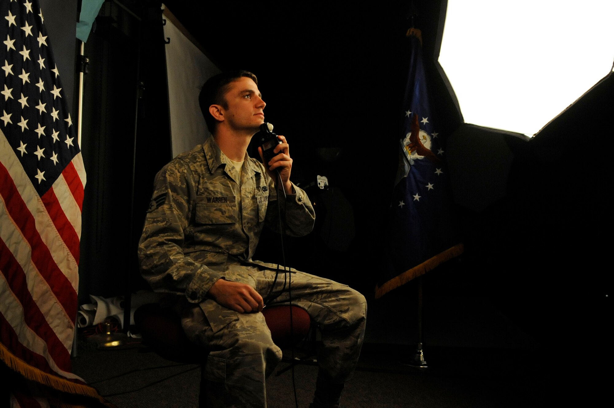Senior Airman Chad Warren, 2nd Bomb Wing Public Affairs photographer, meters the photo studio lights Jan. 12 at Barksdale Air Force Base, La. Wing annual award nominees must have official photos to accompany their packages and can schedule an appointment through the 2 BW PA office by calling 456-3241 or 456-1015. Jan. 20-21 are set aside for the annual award nominees for official photos. Starting Jan. 24, the Public Affairs studio will be open for scheduled appointments Mondays and Tuesdays for regularly scheduled head and shoulders appointments. (U.S. Air Force photo/Staff Sgt. John Gordinier) 