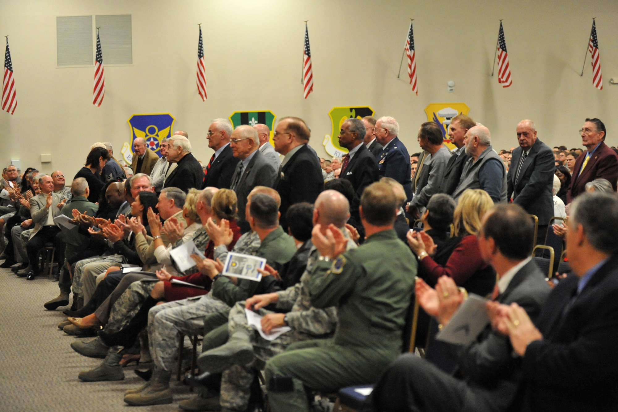 Approximately 40 307th Bomb Wing alumni from World War II, the Korean War, Vietnam and the Cold War era are recognized during reactivation ceremonies for the 307th Bomb Wing in Hoban Hall at Barksdale Air Force Base, La., Jan. 8, 2011. During the same ceremonies, the 917th Operations Group was re-designated as the 917th Fighter Group and the 917th Wing was deactivated. (U.S. Air Force photo/Staff Sgt. Travis Robertson)